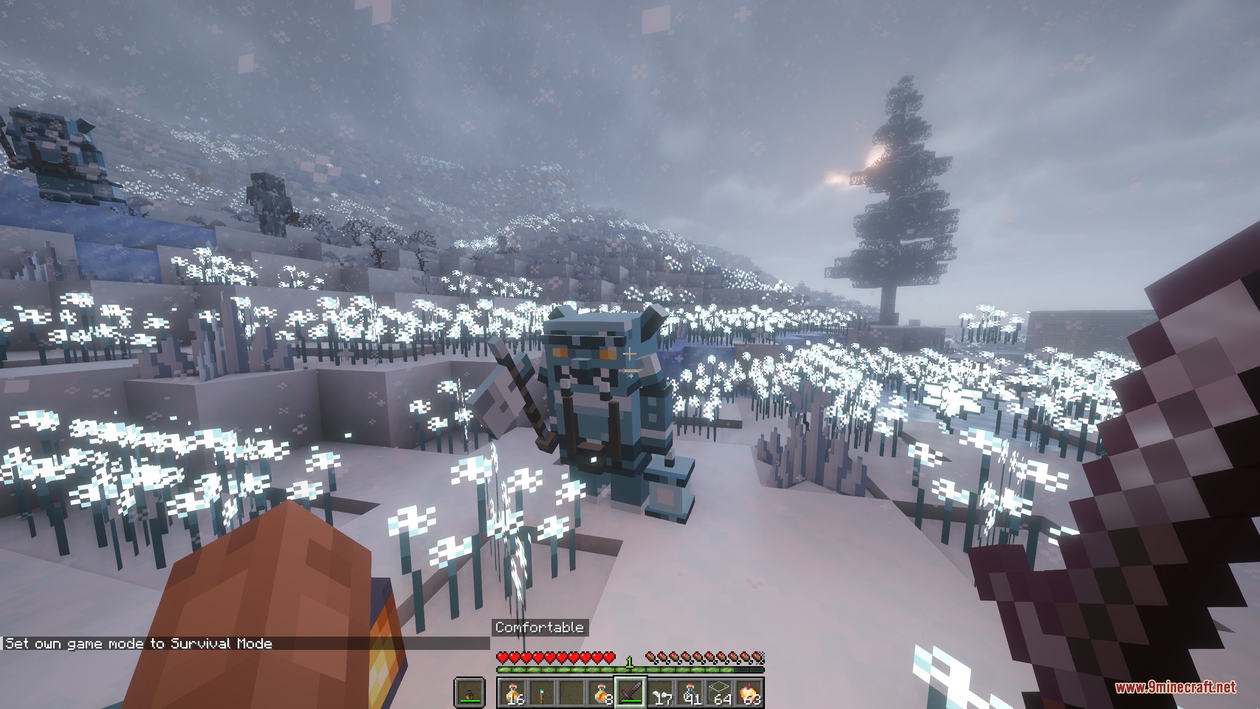 A player confronts an icy goblin enemy in a snowy winter biome