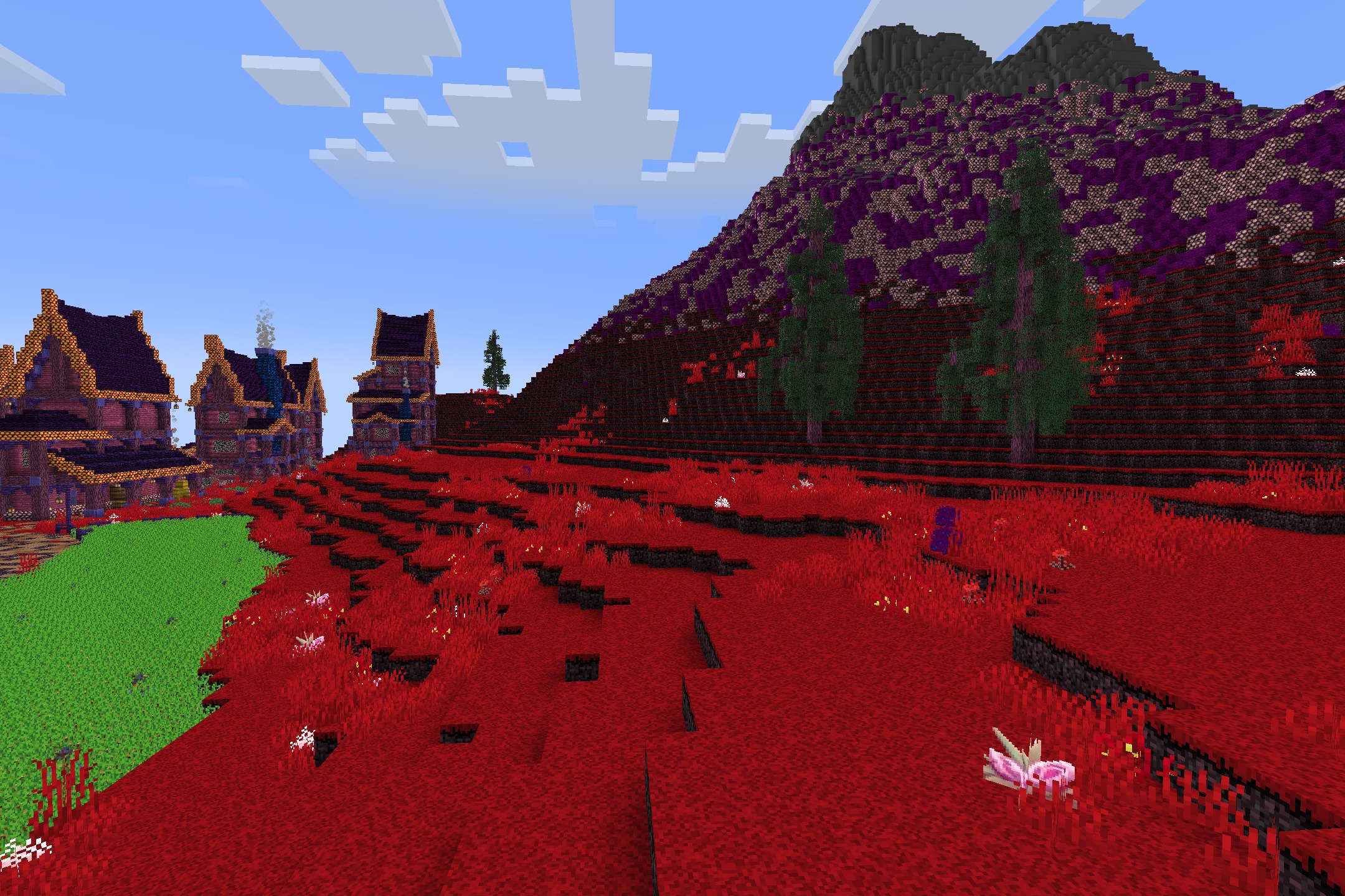 Hazbin Hotel + Helluva Boss Pack Resource Pack Screenshot 4 Vibrant red landscape featuring purple mountains and stylized buildings in the distance