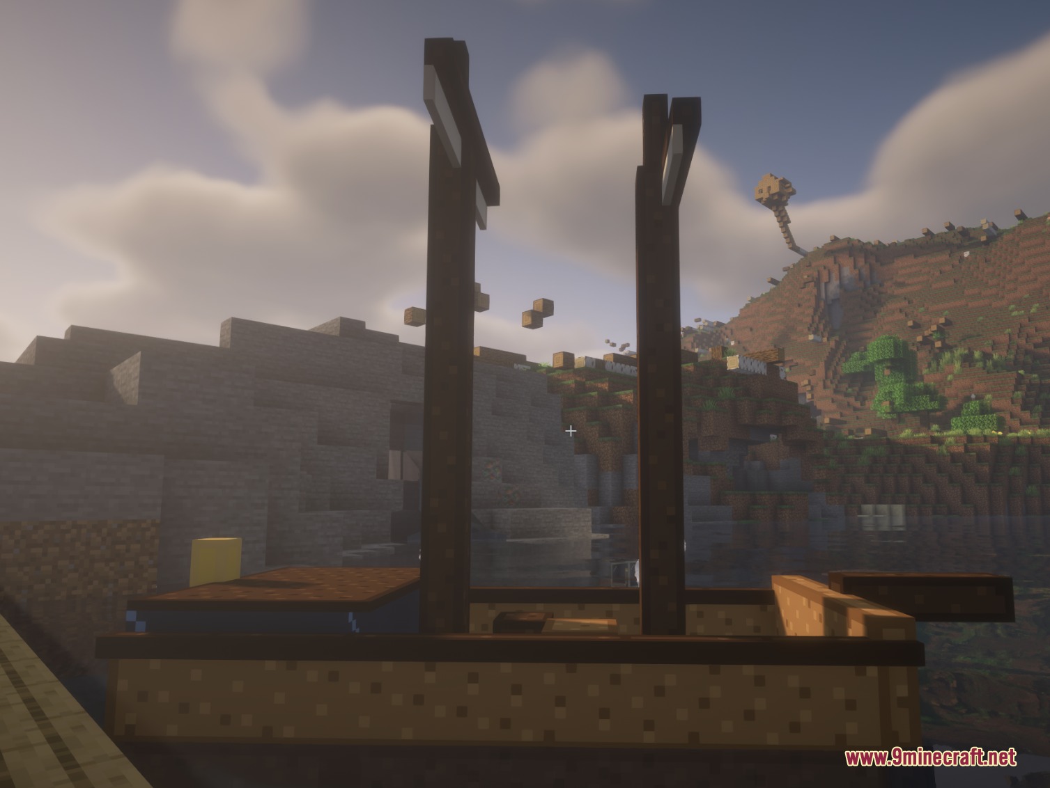 High-resolution Vessel Craft Mod Screenshot 2 A detailed view of a wooden ship deck and mast overlooking the coast