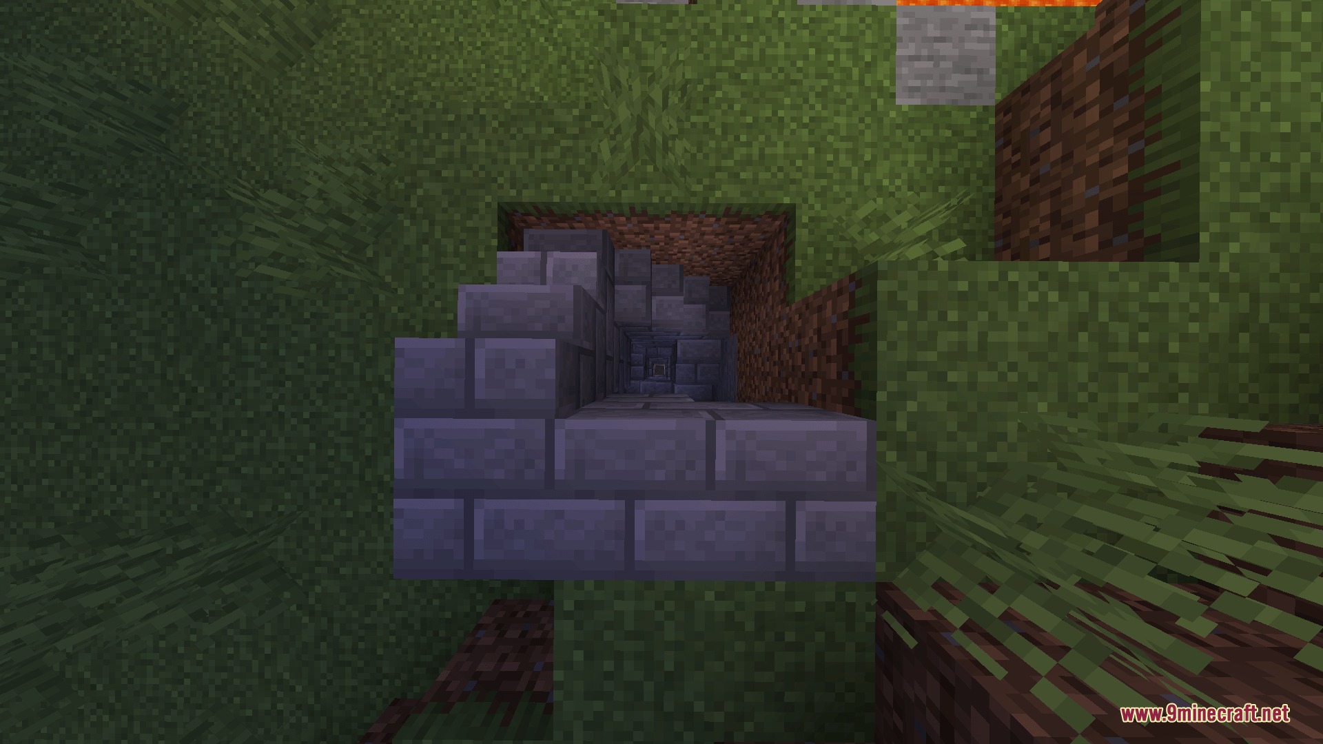 Hollow Altar Rite Mod Screenshot 4 A stone brick staircase leads down into a dark hole in the ground