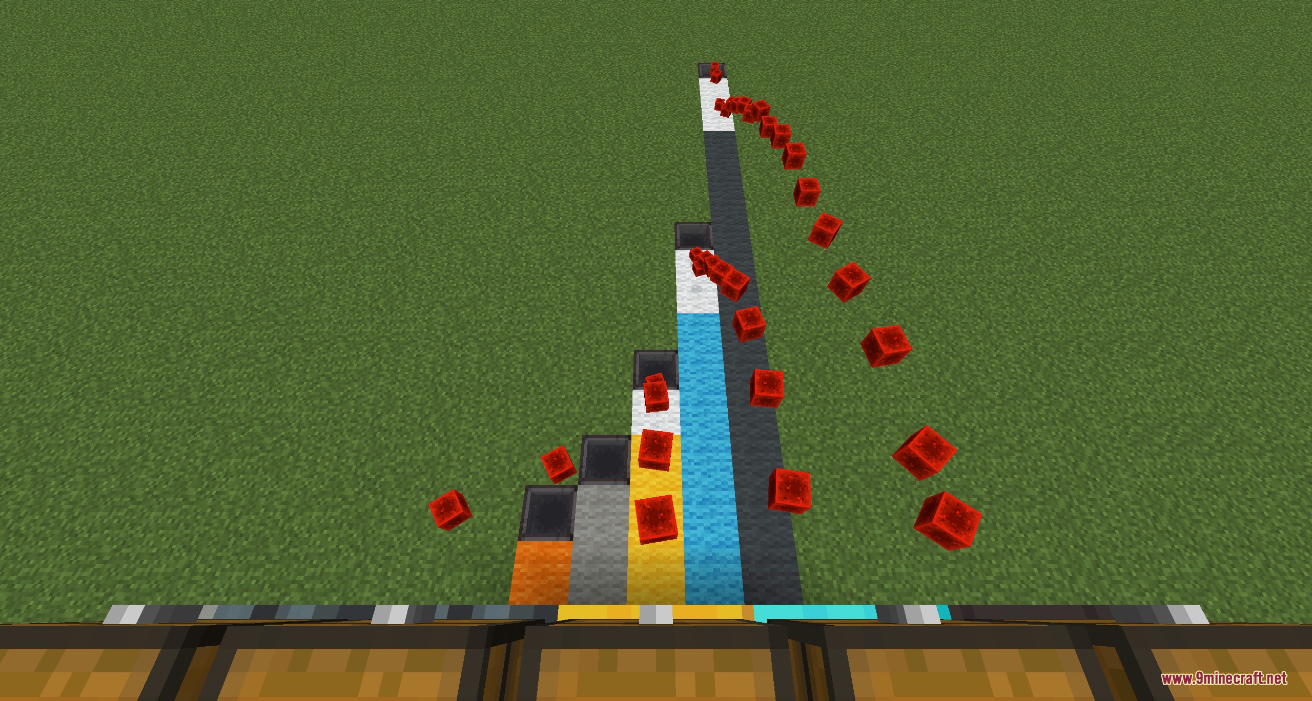 Hopper X Treme Mod Screenshot 4 Glazed hoppers shooting red blocks into the air at different distances across grass
