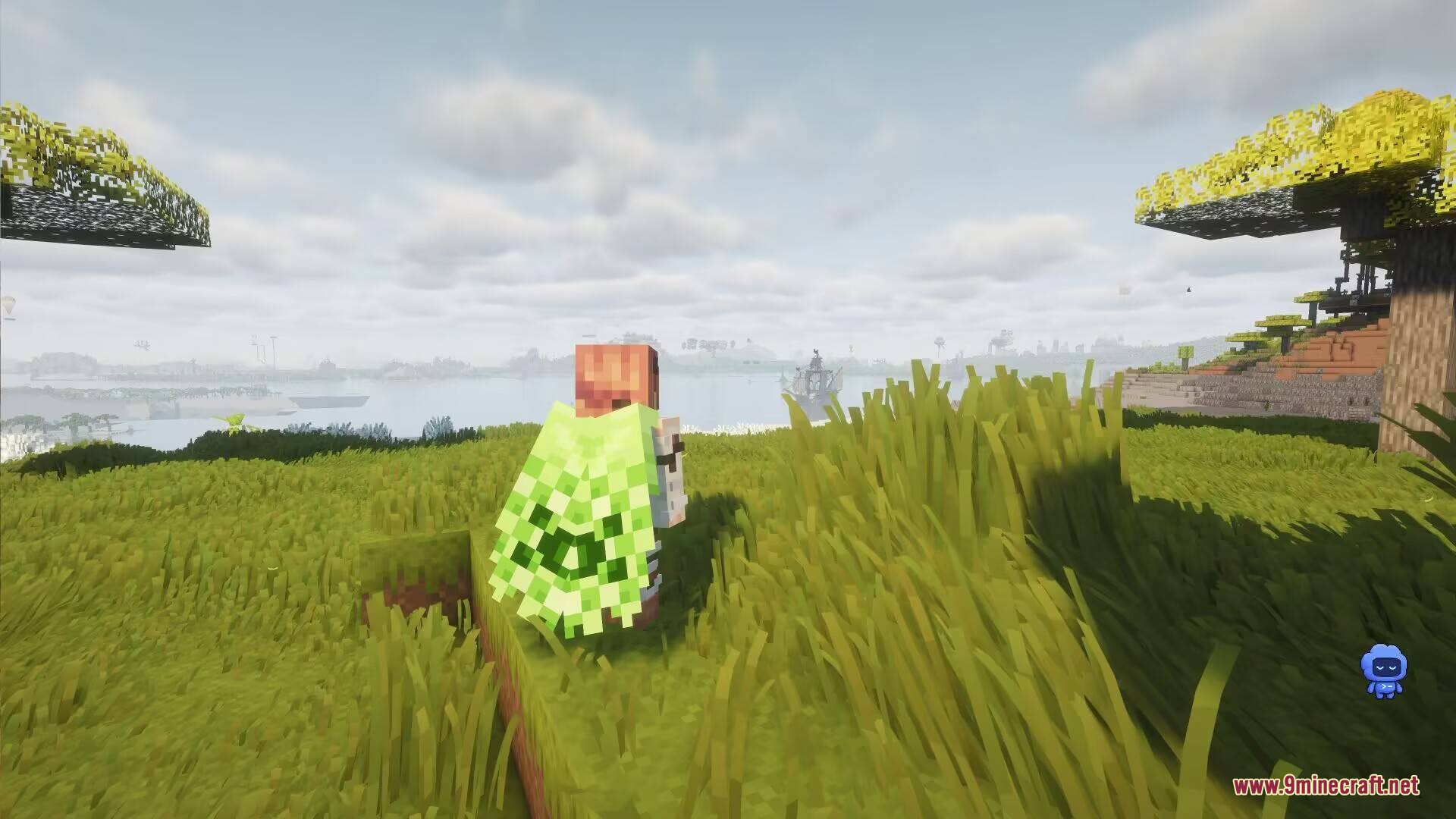 Horizon Reach Render Mod Screenshot 4 A player wearing a green creeper cape stands on a grassy hill