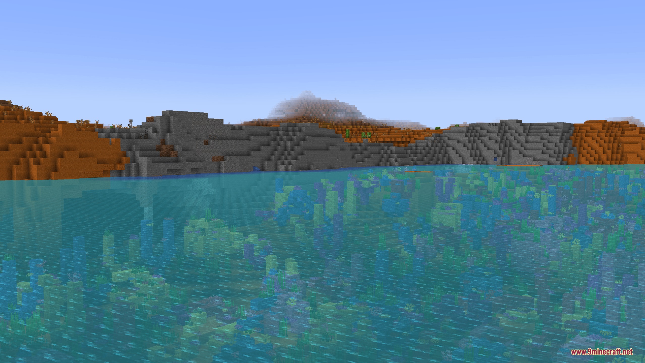 Horizon Tapestry Mod Screenshot 7 Clear blue water reveals coral reefs along a red sand beach coastline