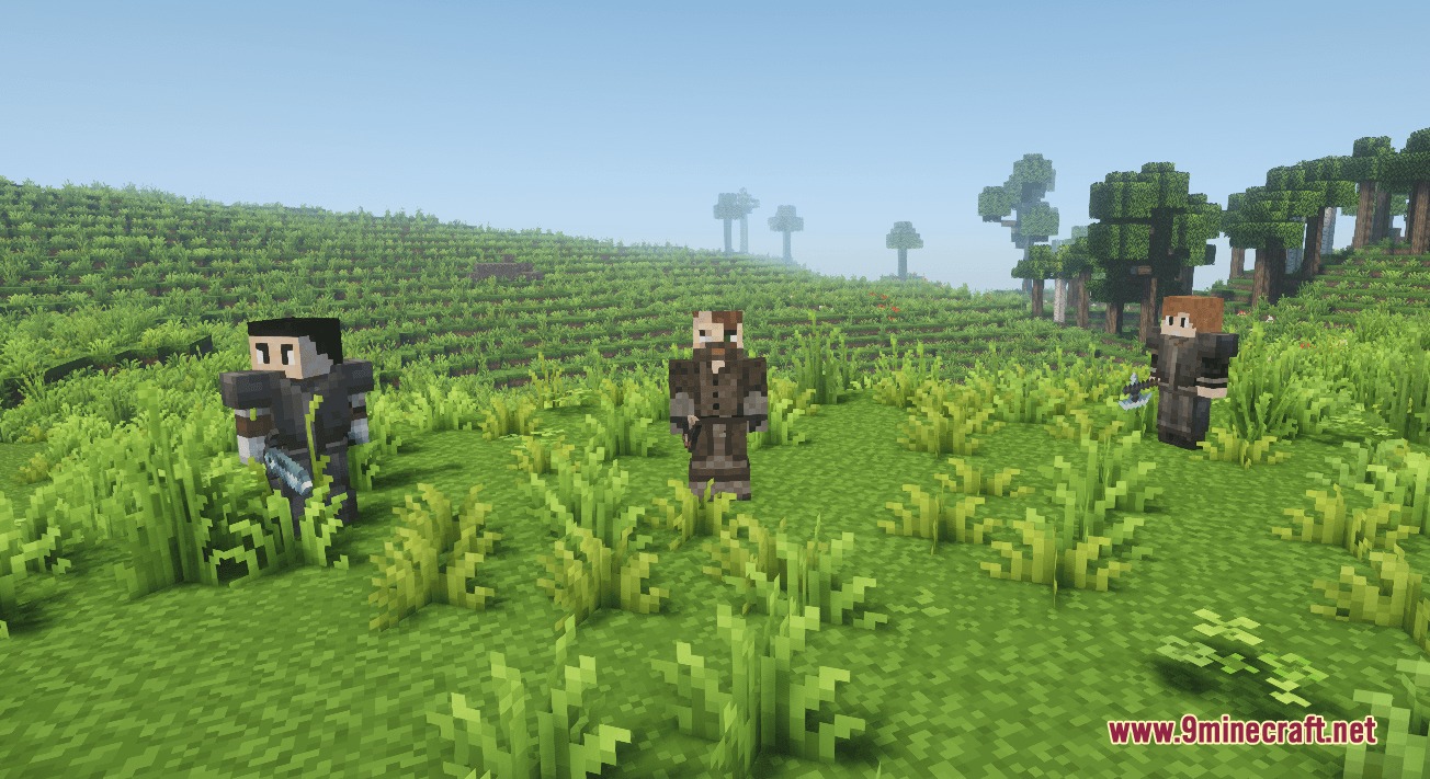 Three armed human survivors standing in a grassy field