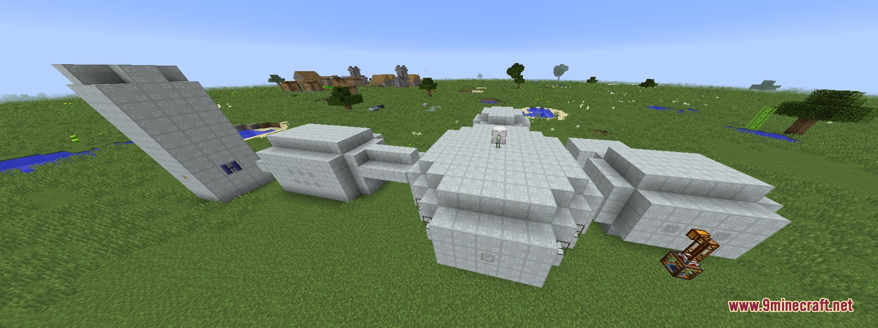 IC2 Additions by Schakaloff Mod Screenshot 2 A large futuristic base built with white blocks in a flat world
