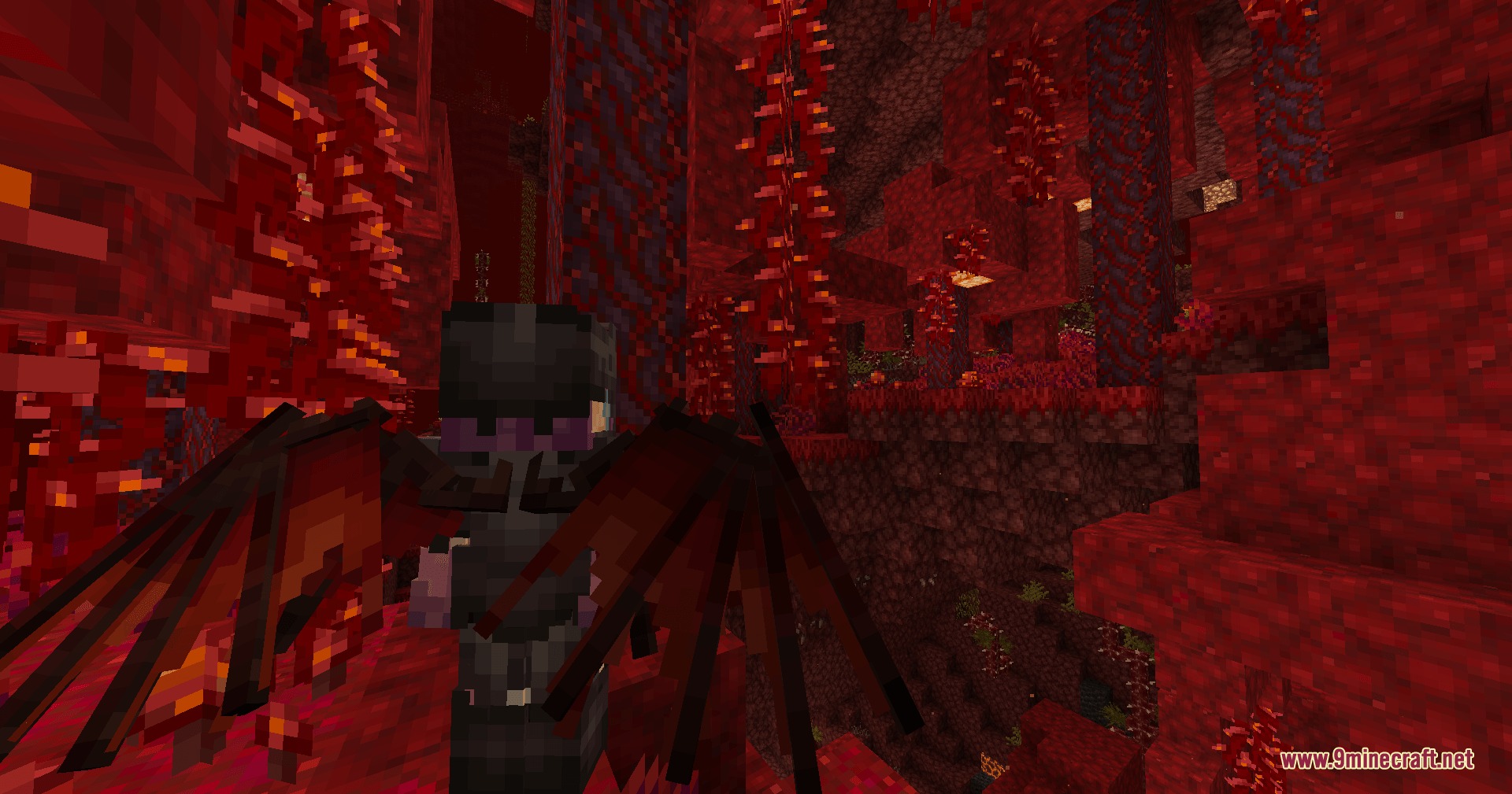Icarus Re Winged by R3ynex Mod Screenshot 4 A player wearing dark membrane wings explores a red crimson forest biome