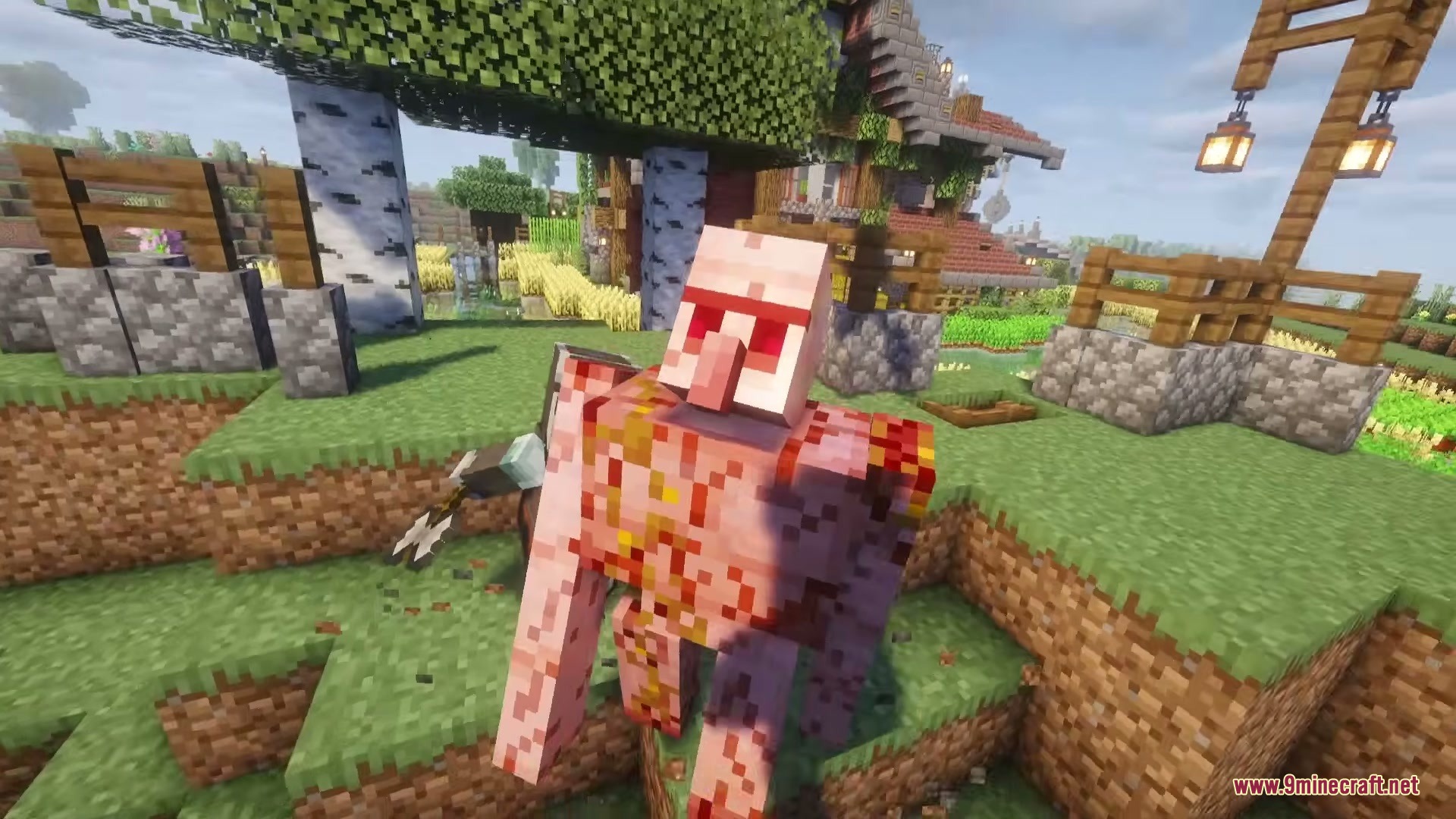 Illager Expansions Mod Screenshot 4 A heavily damaged Iron Golem standing in a village during a sunny day