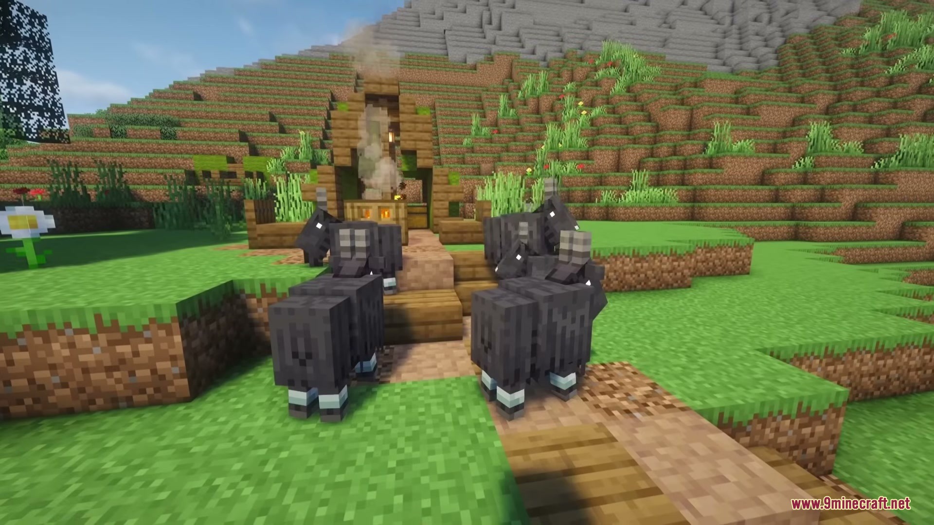 Illager Universe Mod Screenshot 4 A group of Shadow Goats gathers outside a small wooden hillside hut