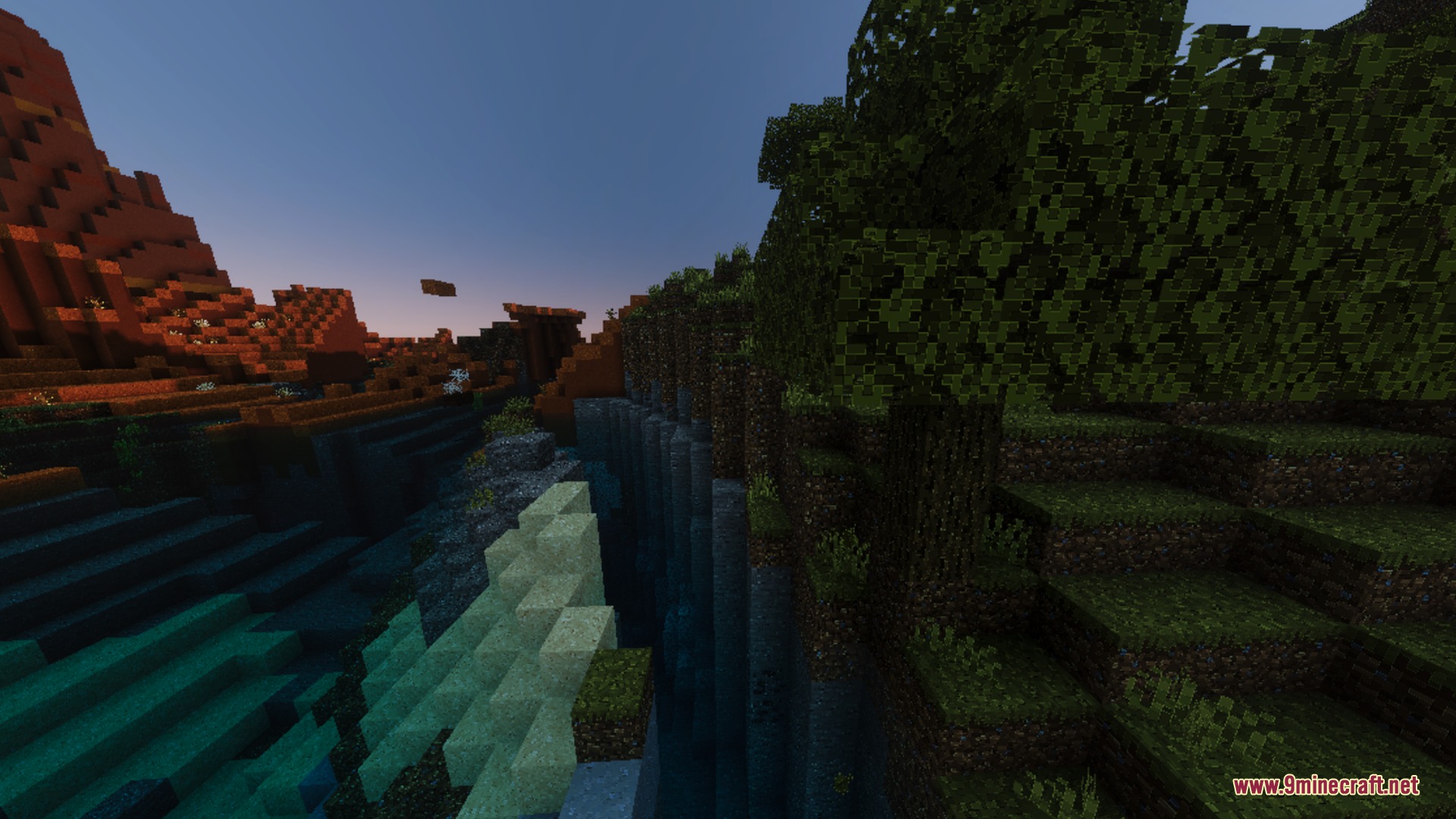 Dramatic lighting over a deep river valley between mesa and forest biomes