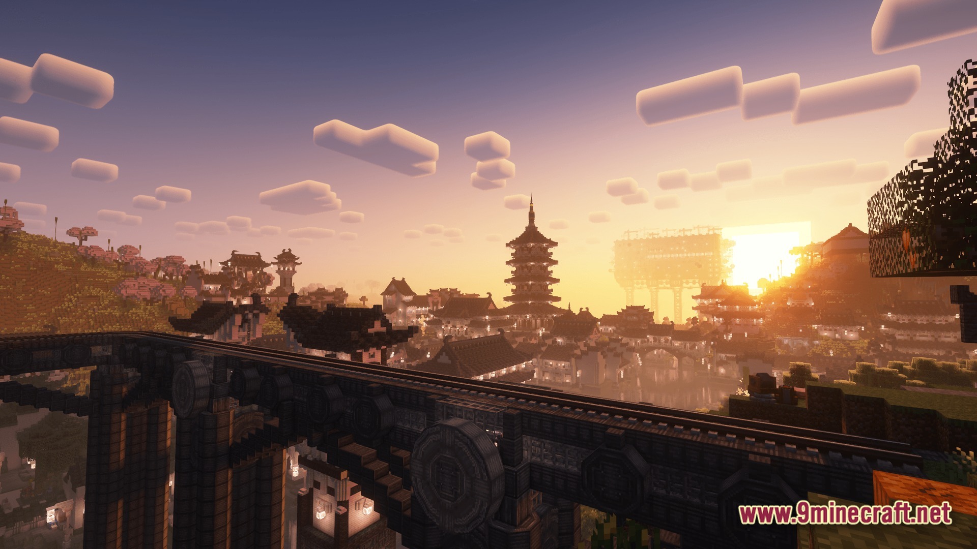 Industrial Banquet Crucible Modpack Screenshot 10 A large industrial bridge overlooks a traditional East Asian city at sunset in a modded landscape