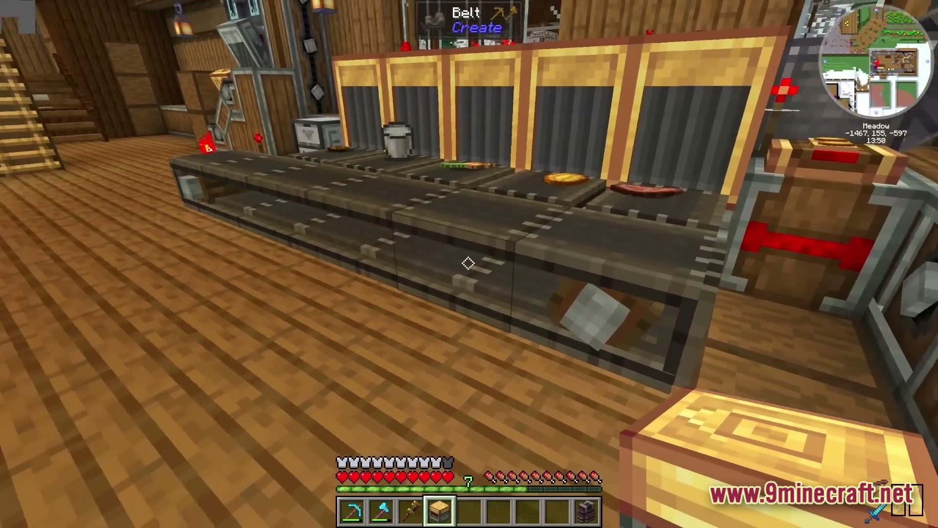 Industrial Banquet Crucible Modpack Screenshot 4 A series of mechanical conveyor belts from the Create mod transporting various food items and ingredients