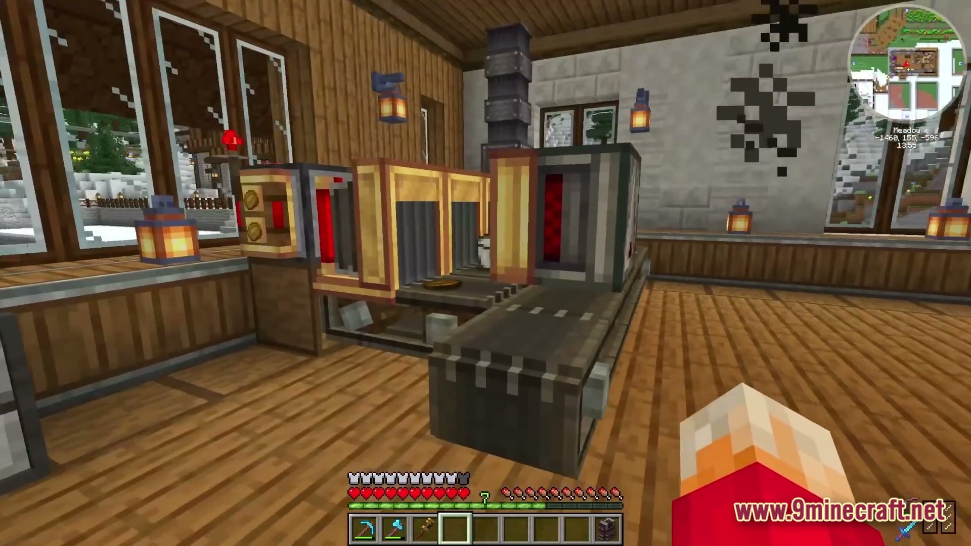 Industrial Banquet Crucible Modpack Screenshot 5 An automated food processing line with conveyor belts inside a wooden and stone building