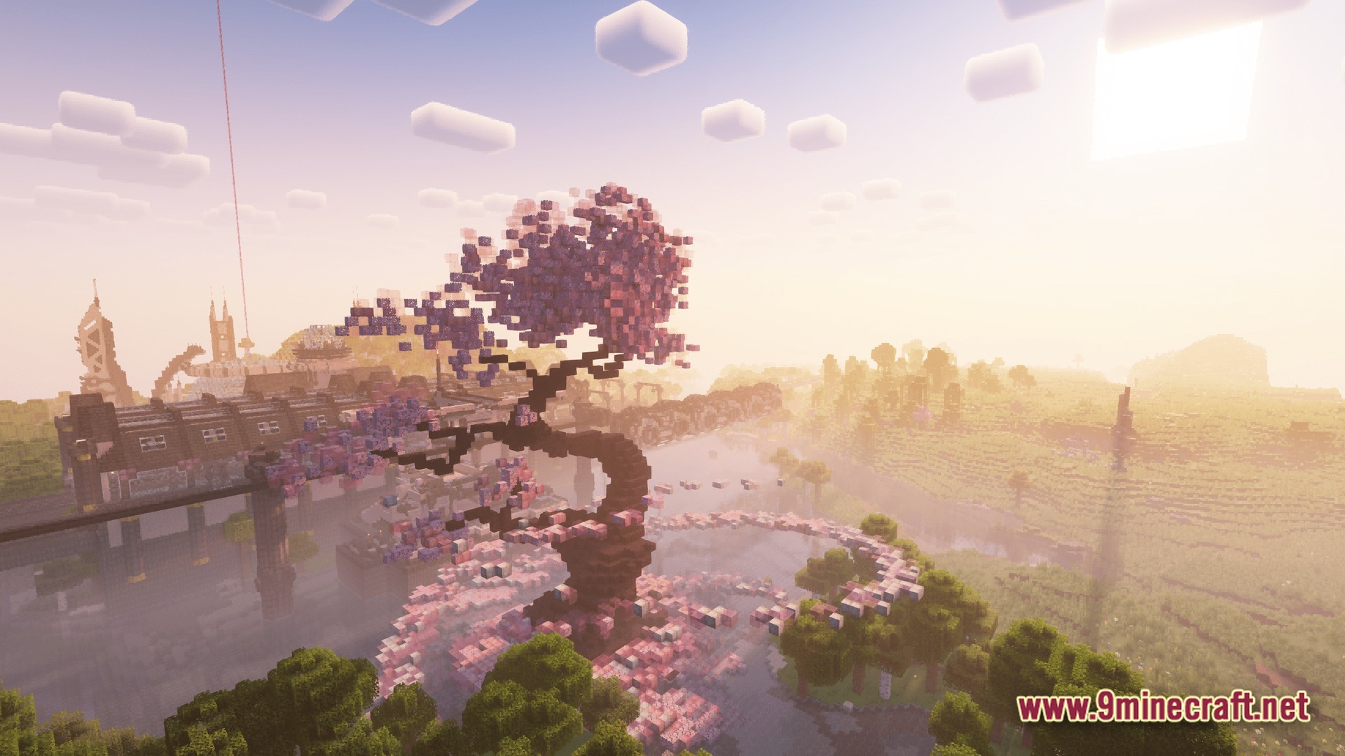Industrial Banquet Crucible Modpack Screenshot 7 A large custom cherry blossom tree stands near industrial structures and a bridge at sunrise