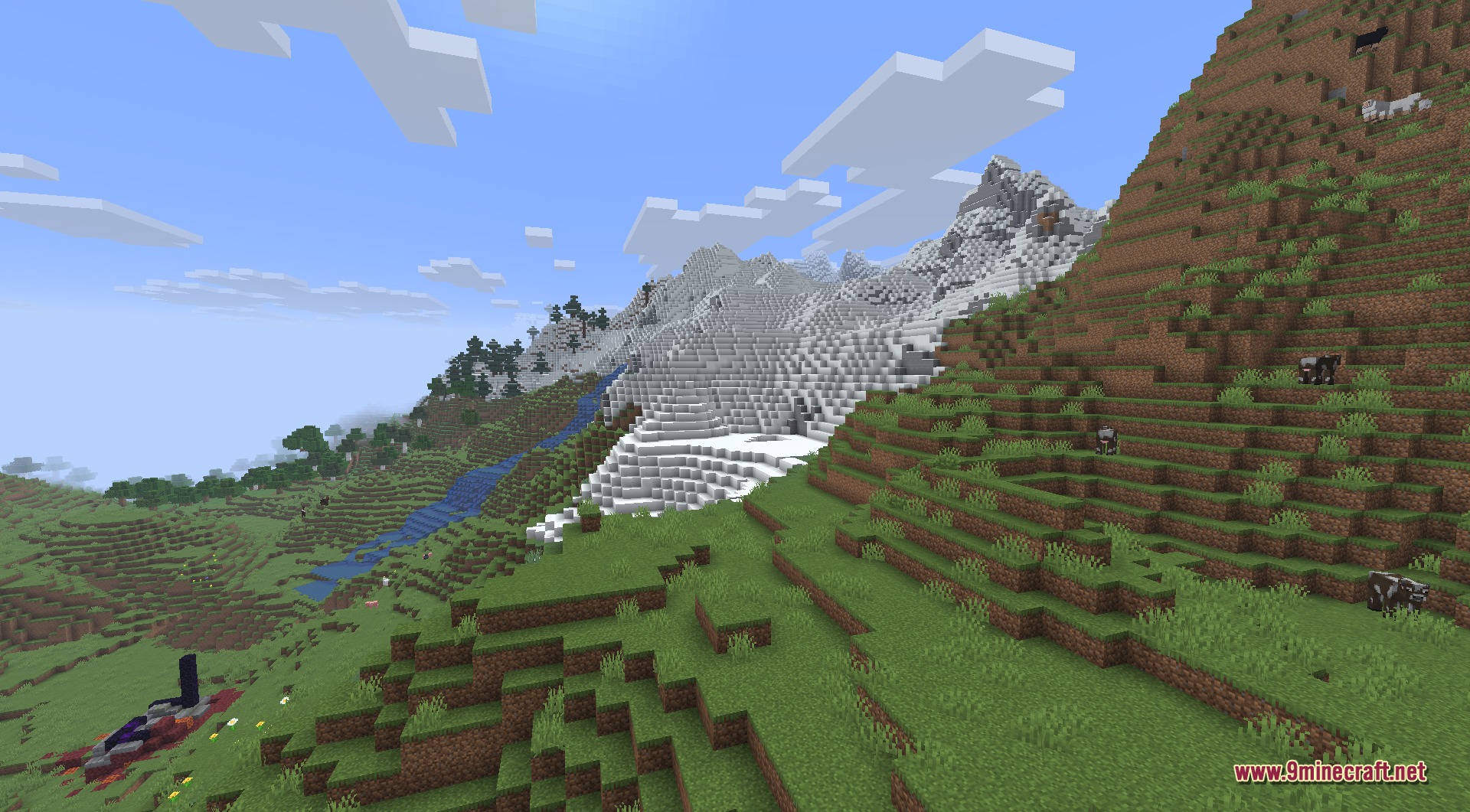 Infinite Music 9minecraft Mod Screenshot 1 A scenic Minecraft landscape with green hills and distant snowy mountain peaks