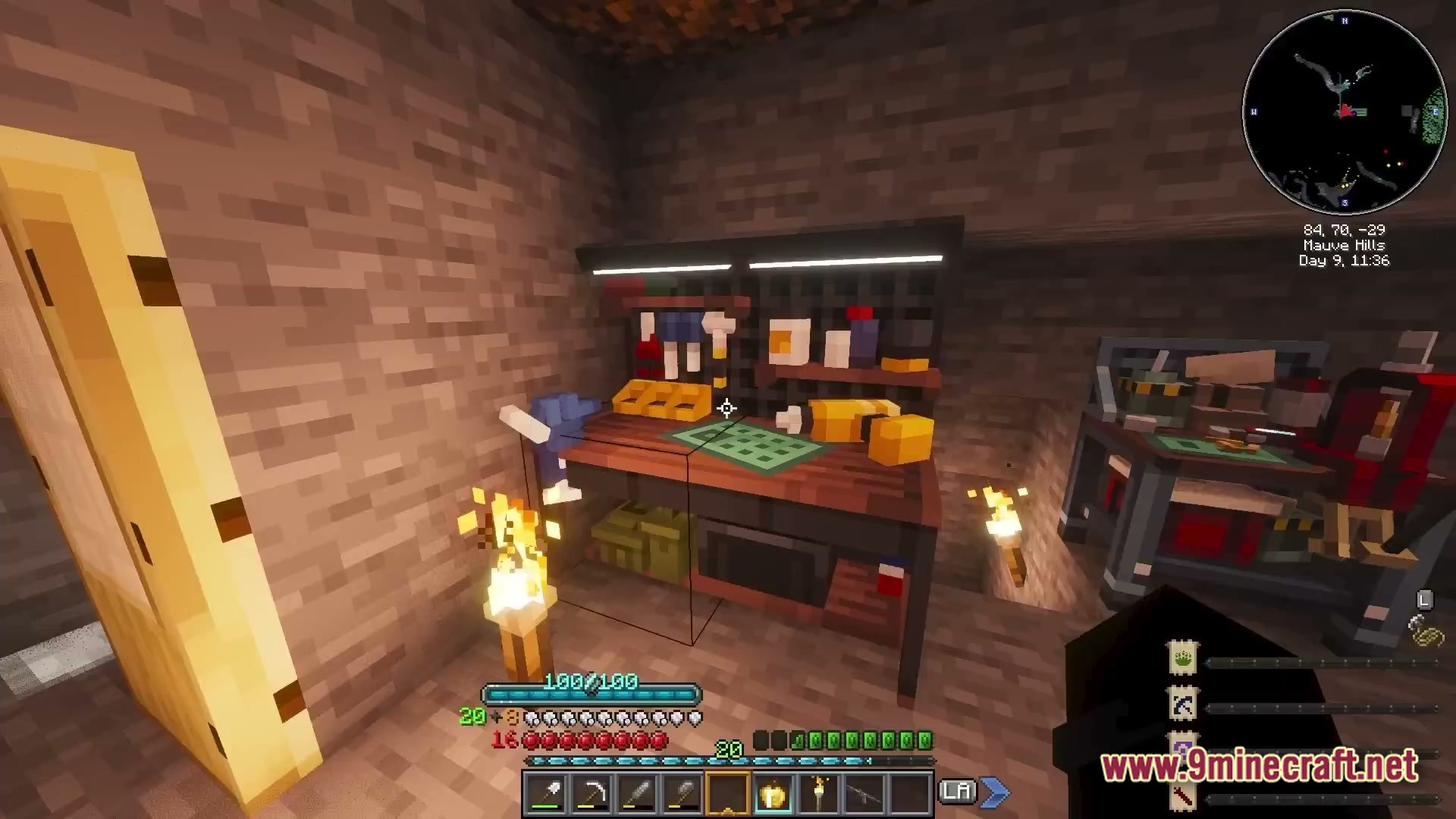 Iron Breach Velocity Modpack Screenshot 4 A detailed workbench station with tools and crafting supplies inside a stone underground base