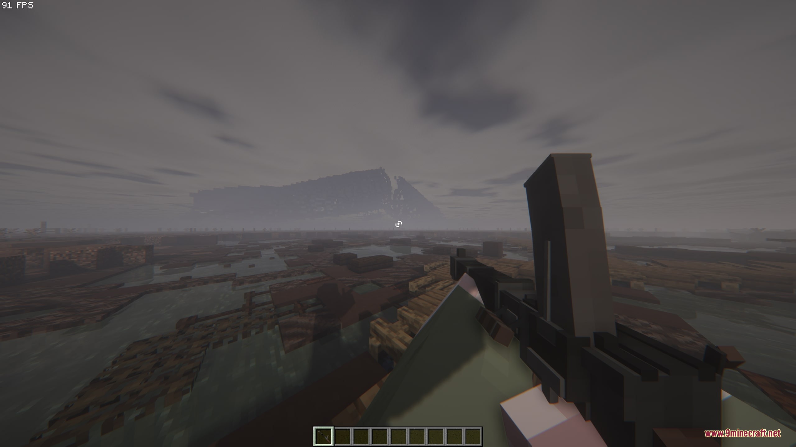 Iron Trenchline Mod Screenshot 7 A player holds a heavy machine gun while looking across a dark battlefield