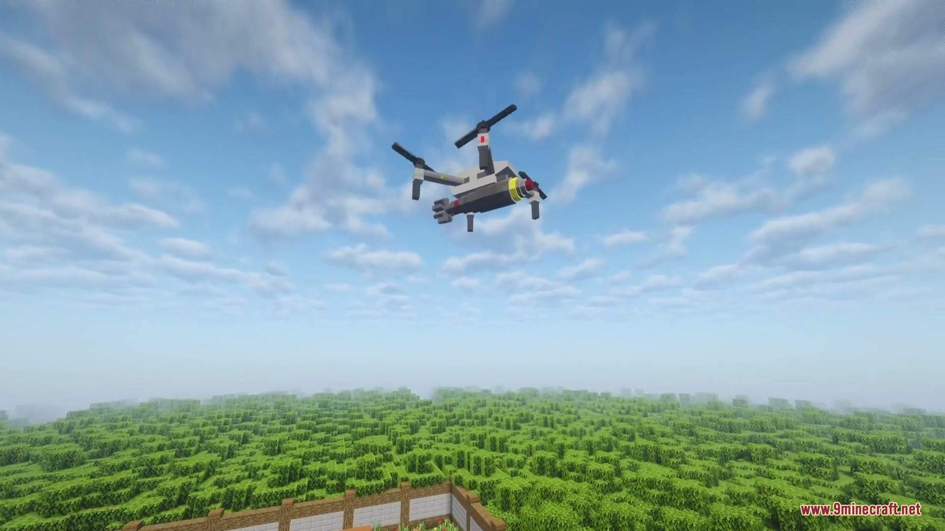 Ironclad Frontline Mod Screenshot 6 A tilt rotor aircraft flying high above a dense green forest biome
