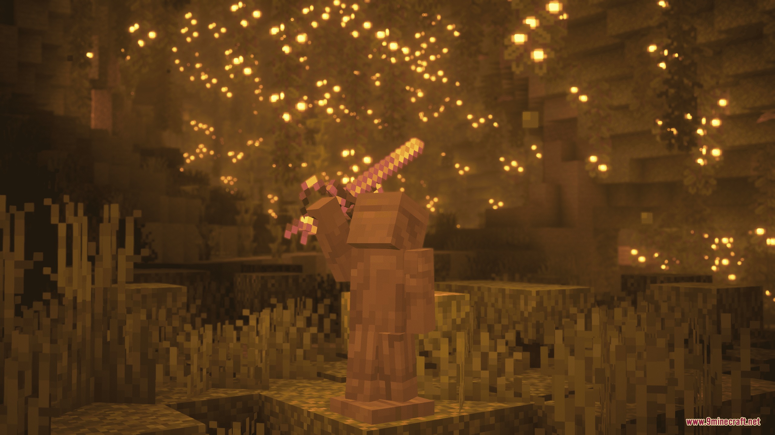 Iron's Spells 'n Spellbooks Reimagined Resource Pack Screenshot 1 Armor stand holding a custom 3D sword surrounded by golden magical particles