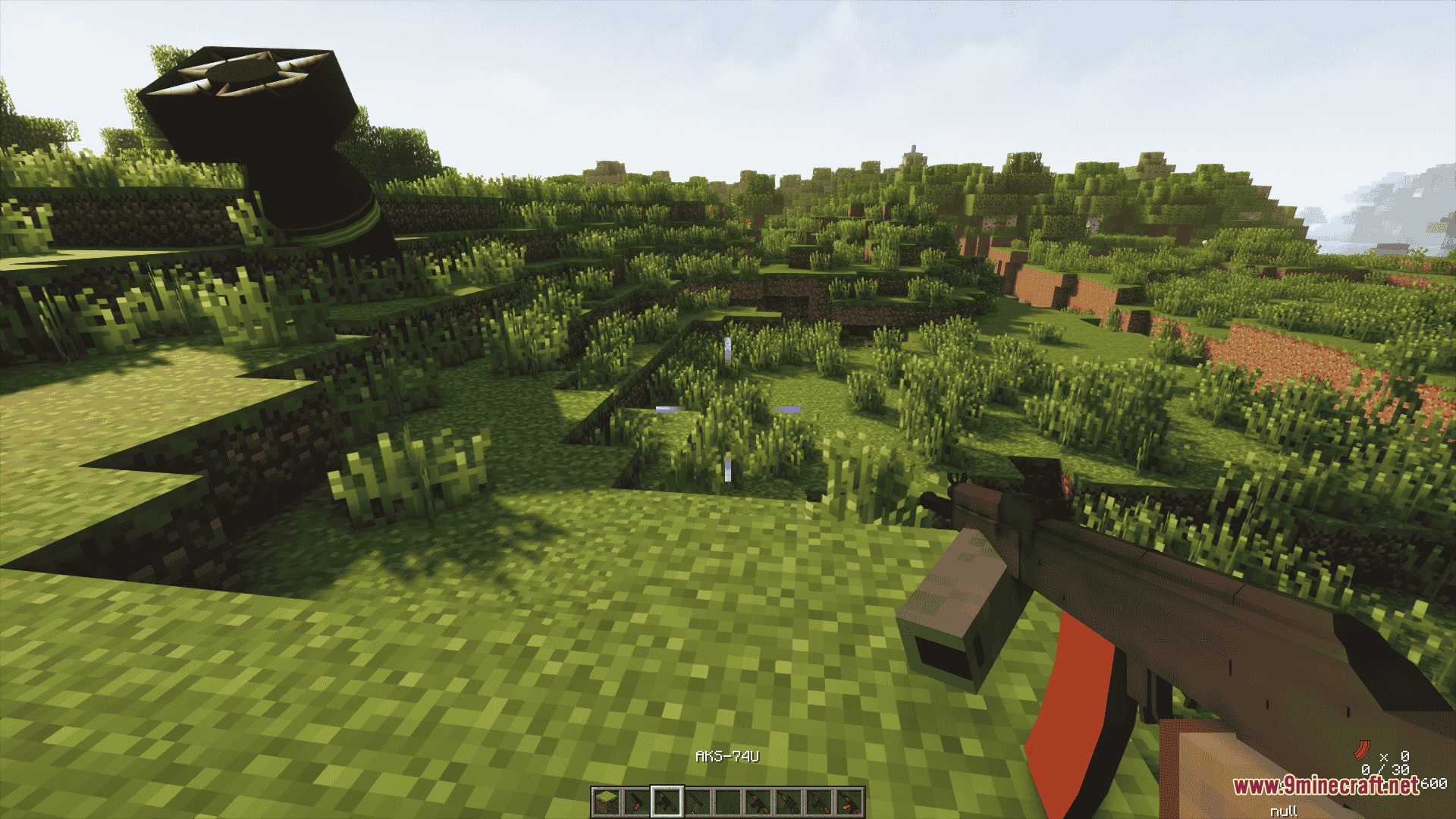 Ironworks Ballistics Mod Screenshot 4 Player holding an AKS 74U rifle in first person view in a forest