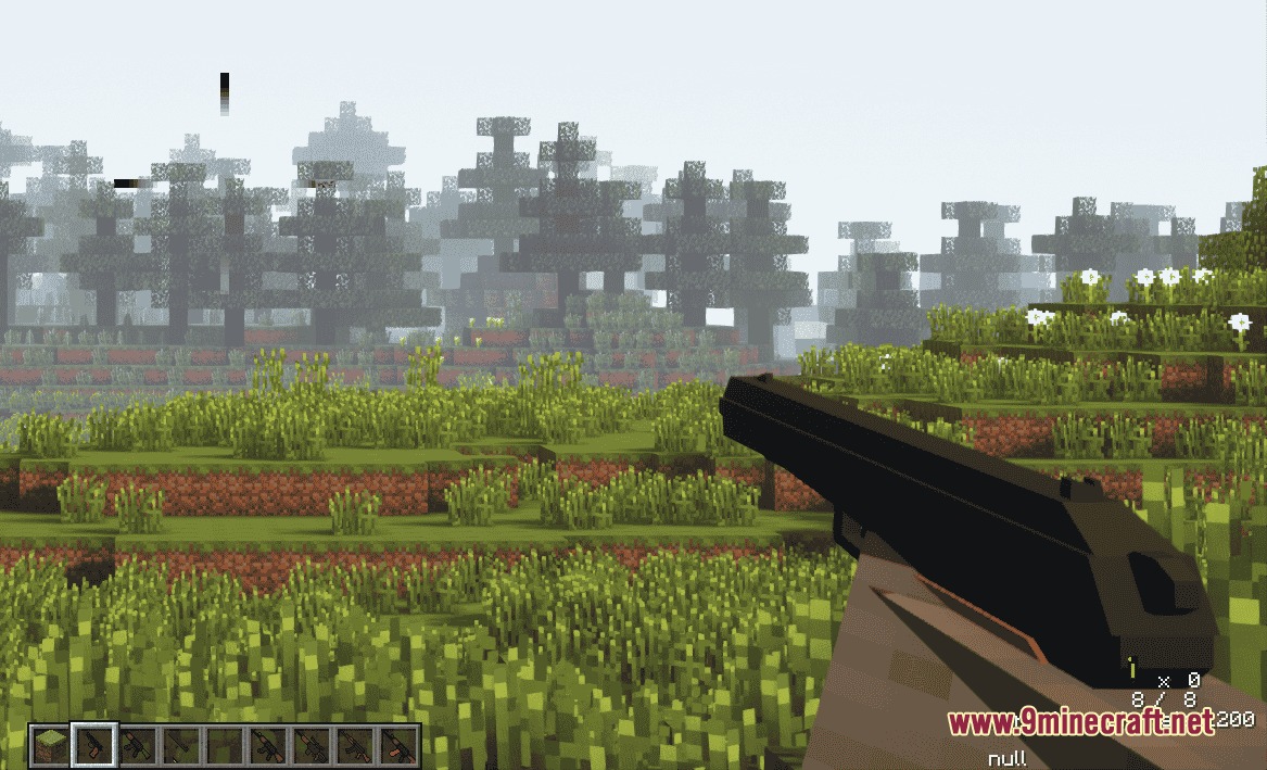 Ironworks Ballistics Mod Screenshot 5 Player holding a black pistol from the Ironworks Ballistics Mod in Minecraft