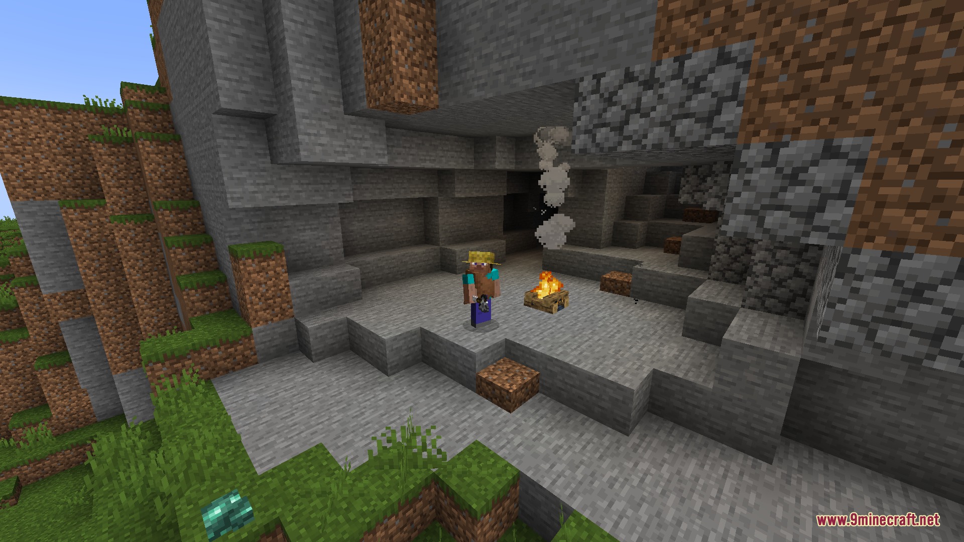 JMG's Better Than Ever BTE Mod Screenshot 1 A player wearing a hat stands next to a campfire inside a cave