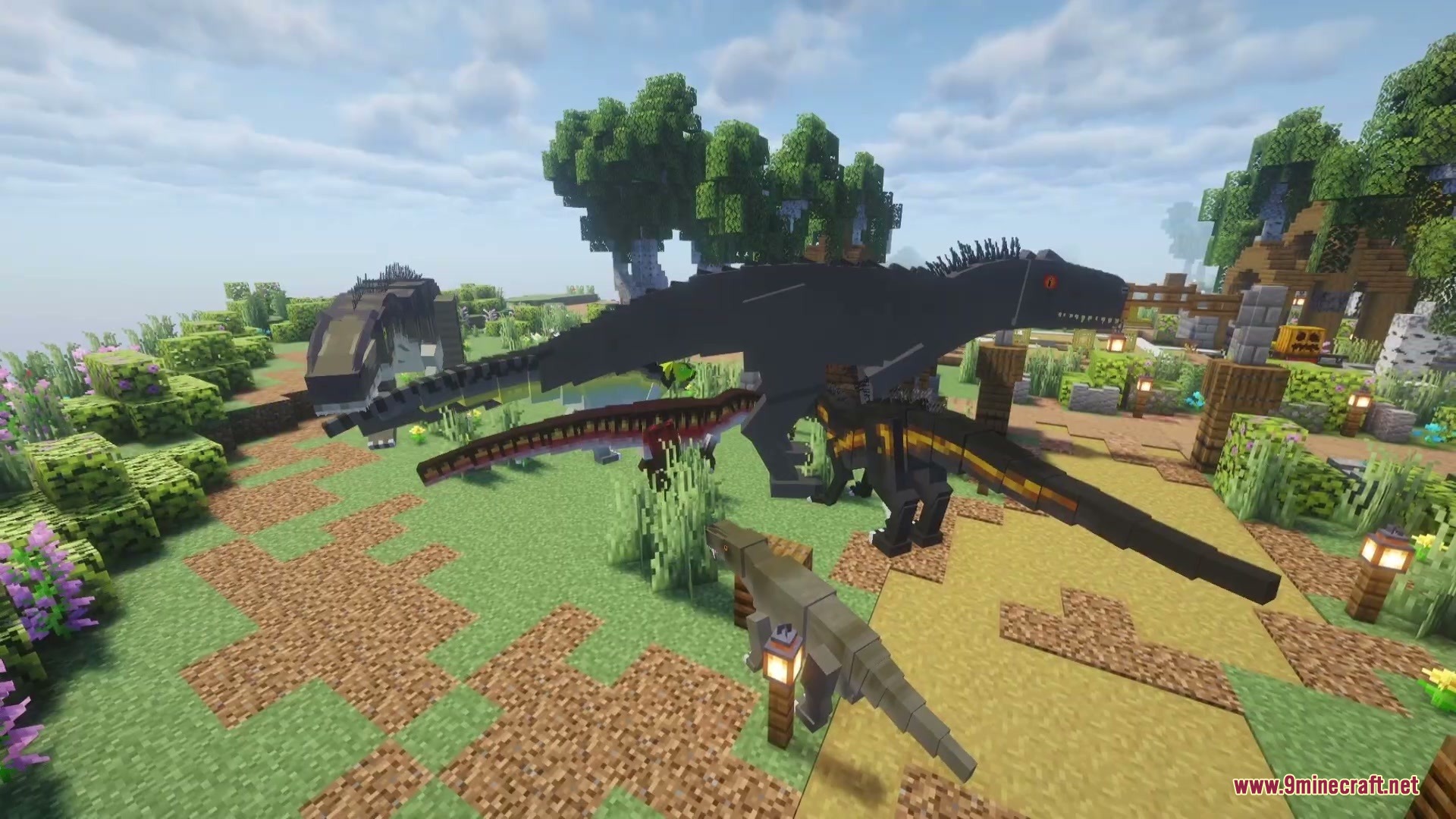 Jurassic Revived Mod Screenshot 3 Several large dinosaurs standing on a dirt path in a scenic park area