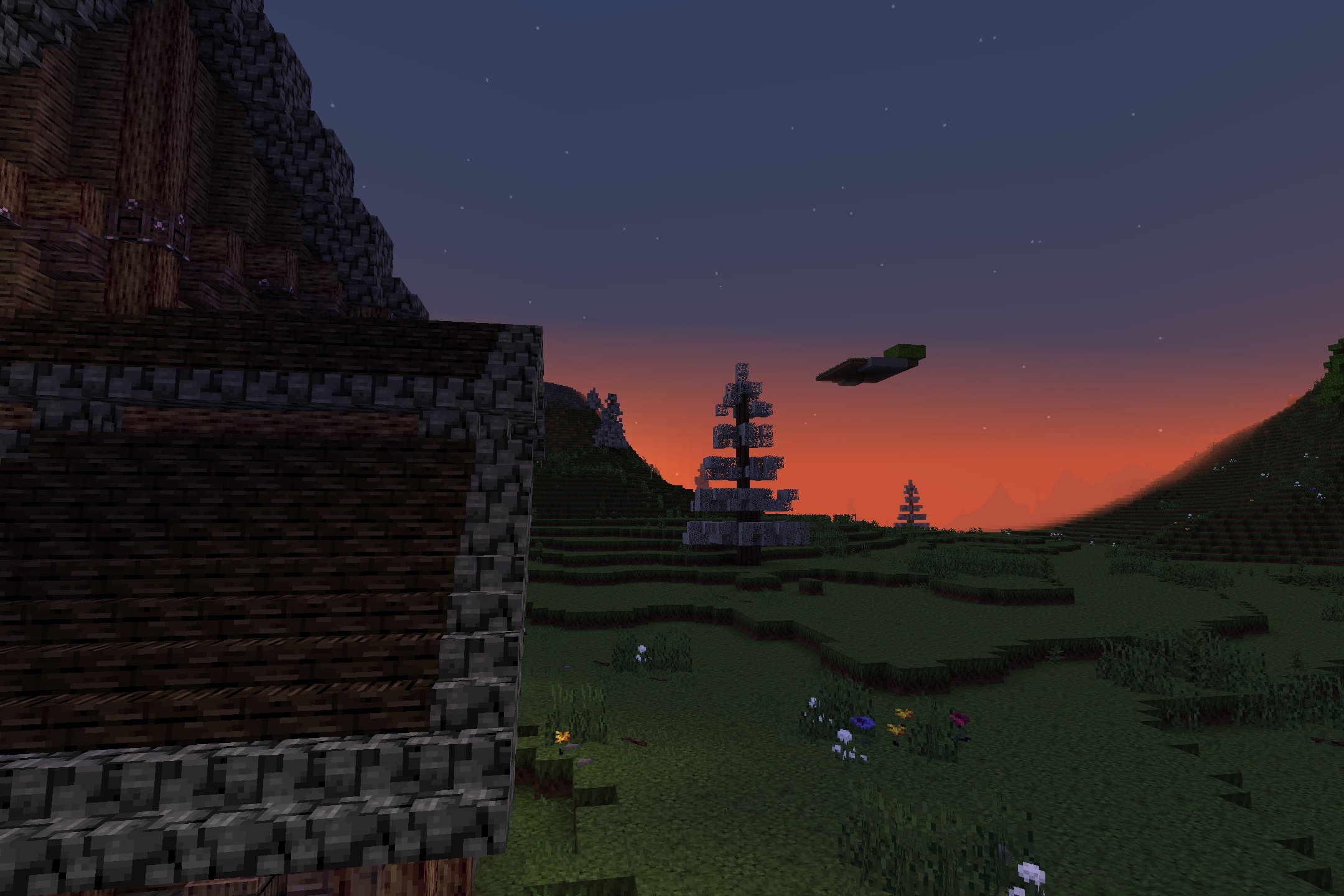 KDCraft~Fantastic Journey Resource Pack Screenshot 10 Spooky medieval landscape at dusk with a glowing orange horizon and trees