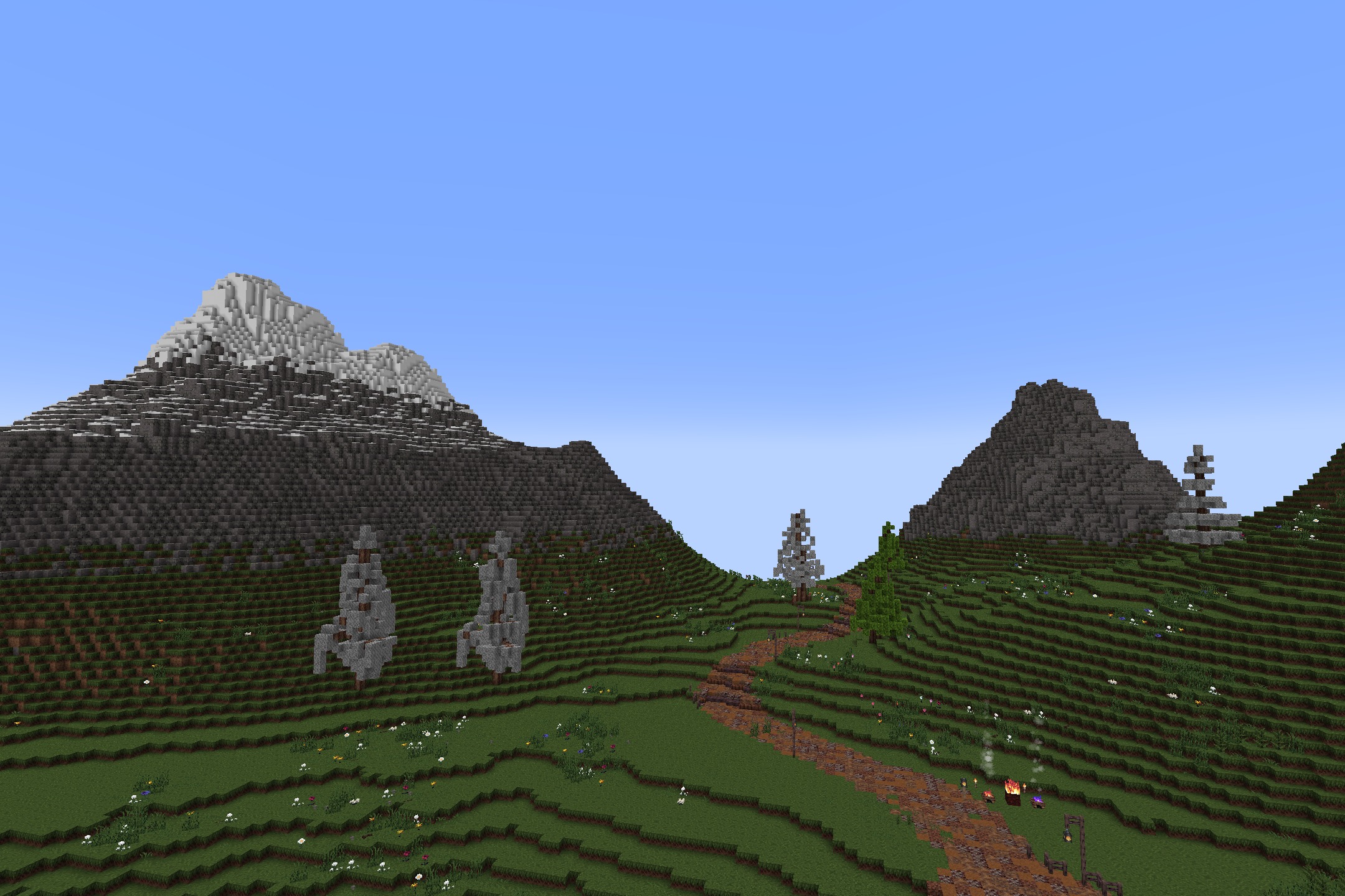 KDCraft~Fantastic Journey Resource Pack Screenshot 3 A winding path through green hills with custom trees and snowy mountains
