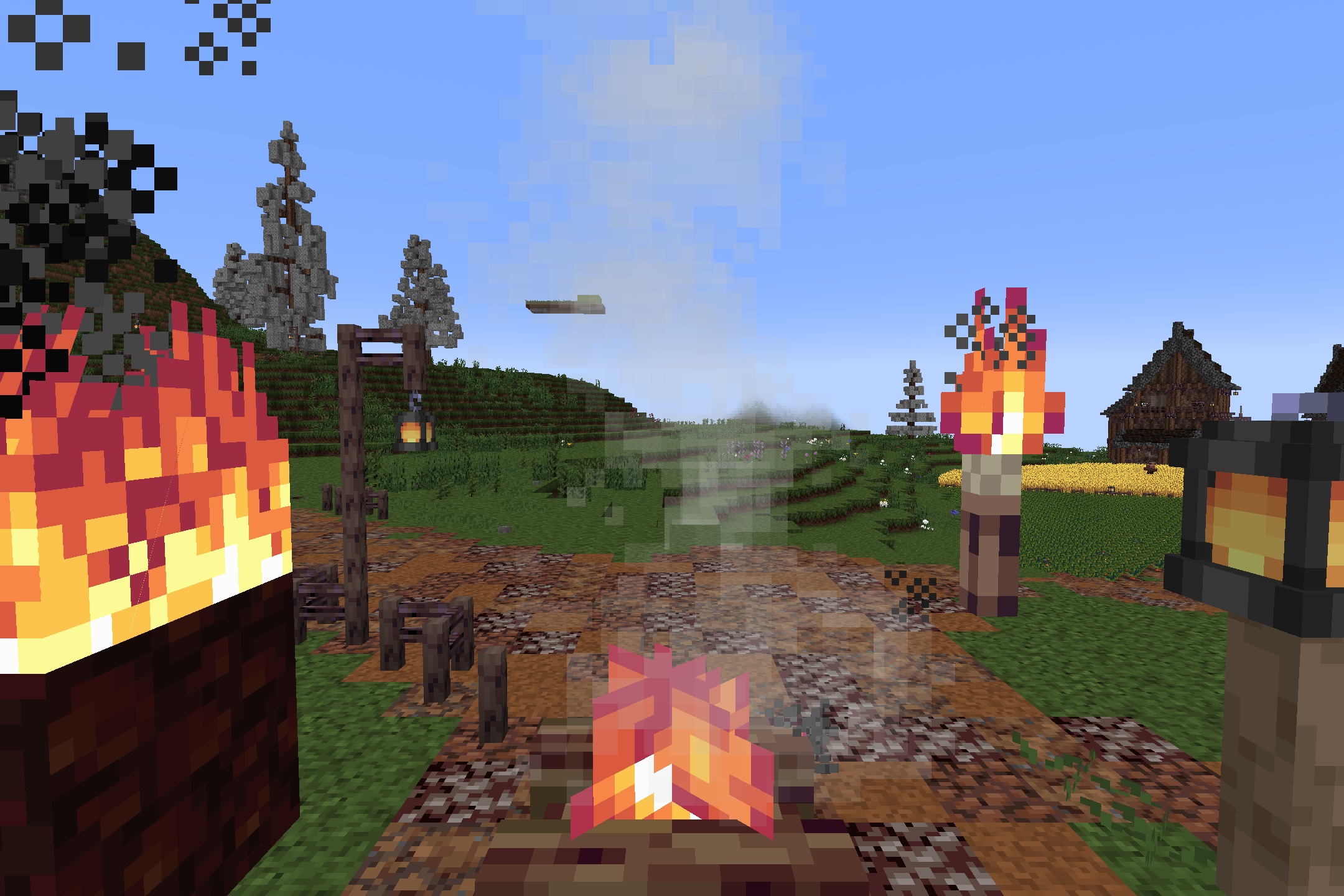 KDCraft~Fantastic Journey Resource Pack Screenshot 4 A campfire burning on a path with lanterns and a wooden building