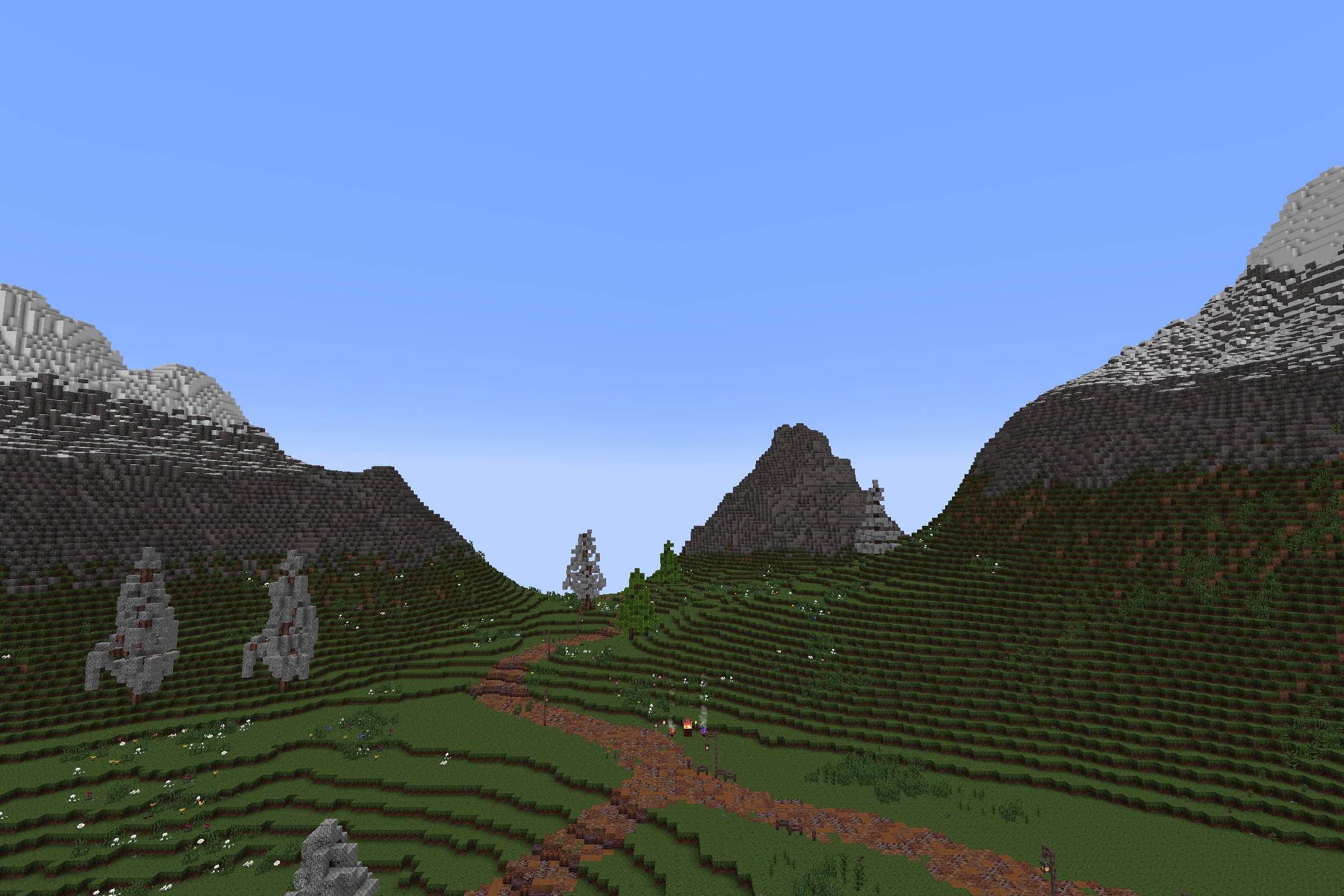 KDCraft~Fantastic Journey Resource Pack Screenshot 5 A winding dirt path leads through green hills toward large snowy mountains