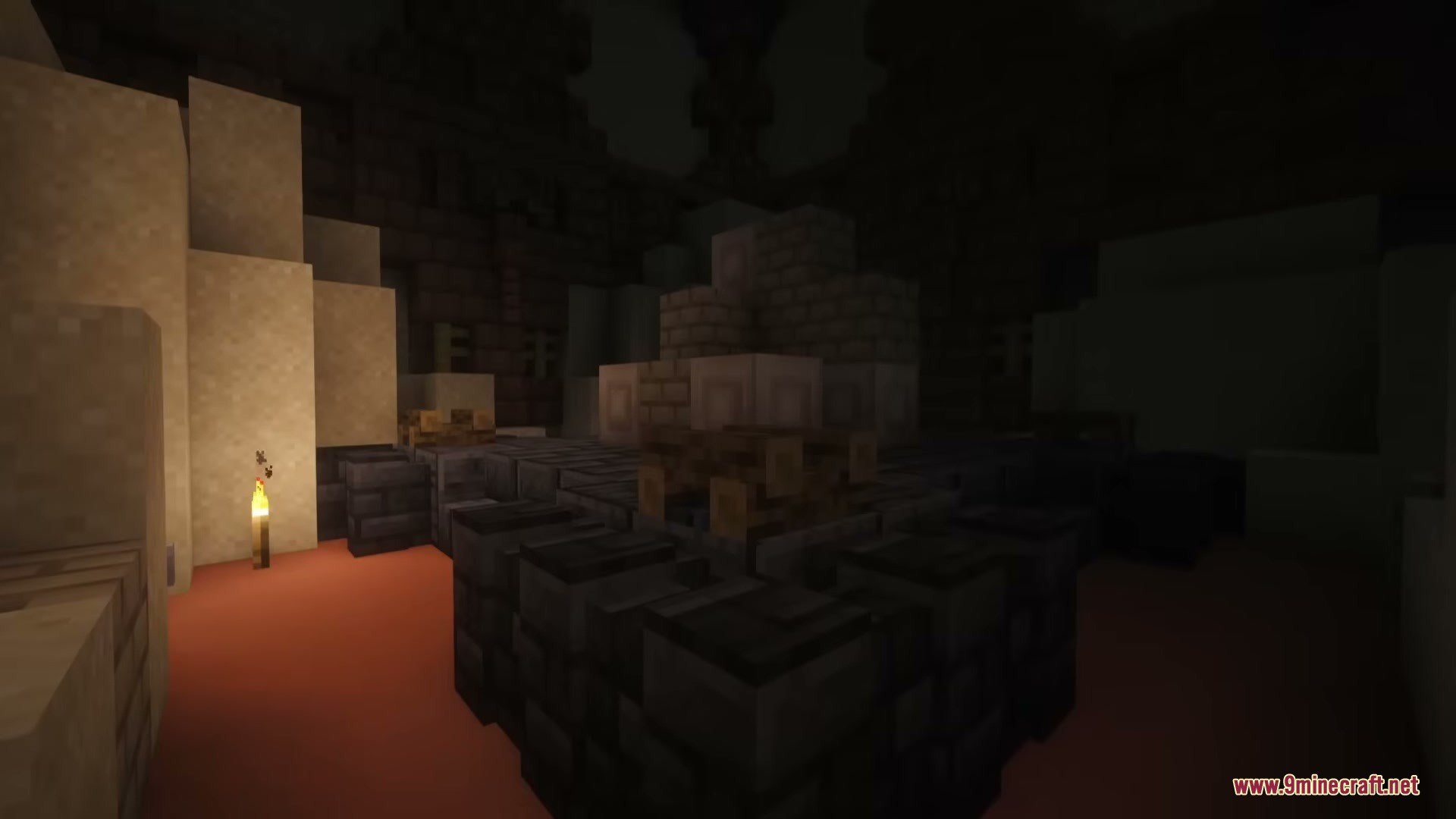 The dark stone interior of the Primal Sanctum temple lit by a torch