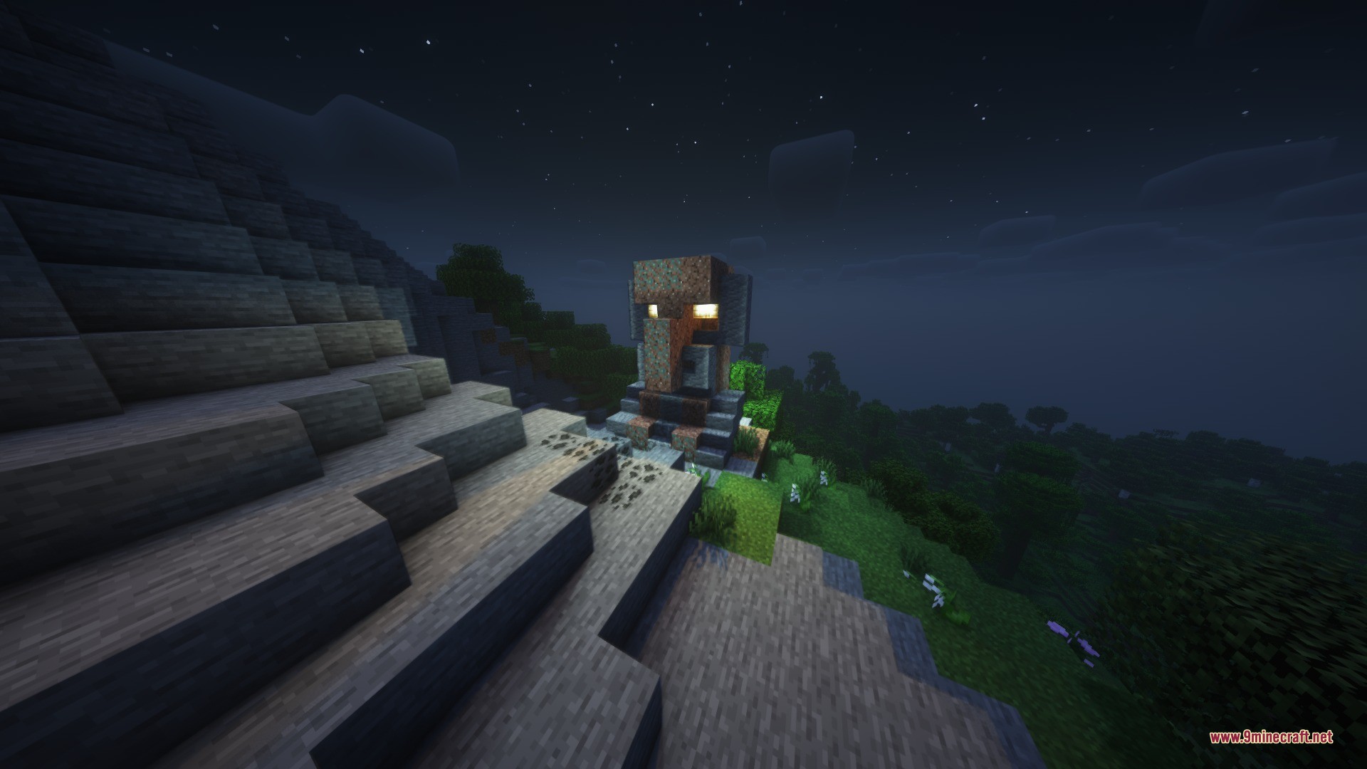 Katters Structures Ambient Data Pack Screenshot 10 Massive stone villager statue with glowing eyes overlooking a forest at night