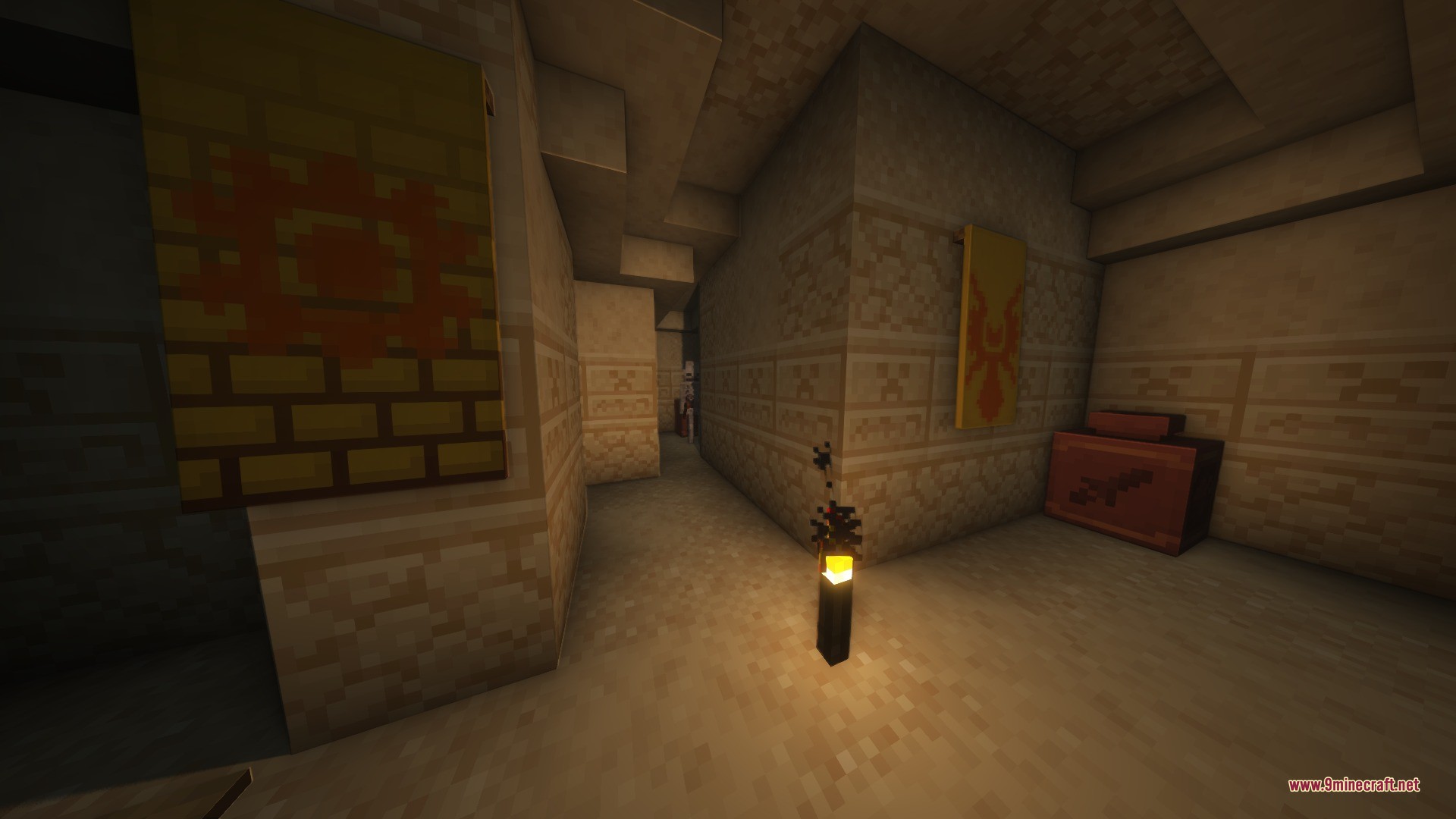 Katters Structures Dungeon Data Pack Screenshot 5 A dark desert dungeon interior featuring sandstone walls and decorative yellow wall banners