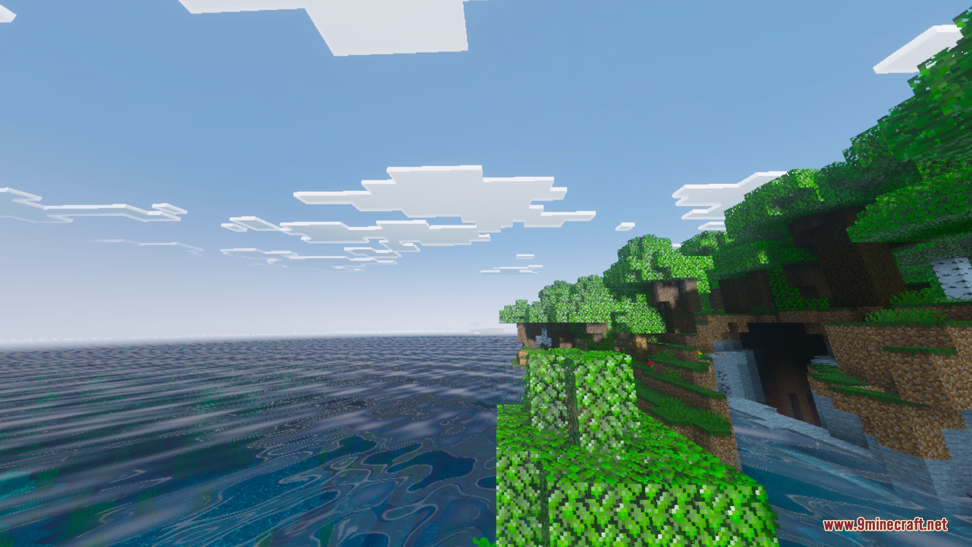 Kinetix Visuals Shader Screenshot 2 Lush green trees on a cliff overlooking clear water with realistic lighting