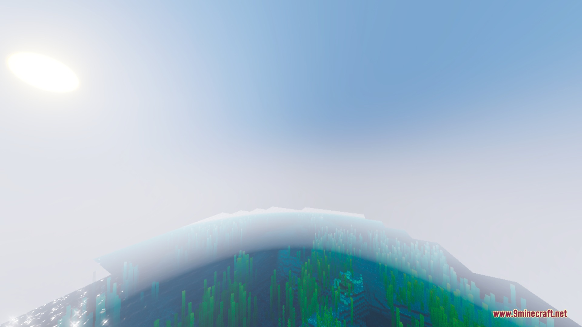 Kinetix Visuals Shader Screenshot 6 Bright sunlight illuminates a hazy blue sky over clear ocean water