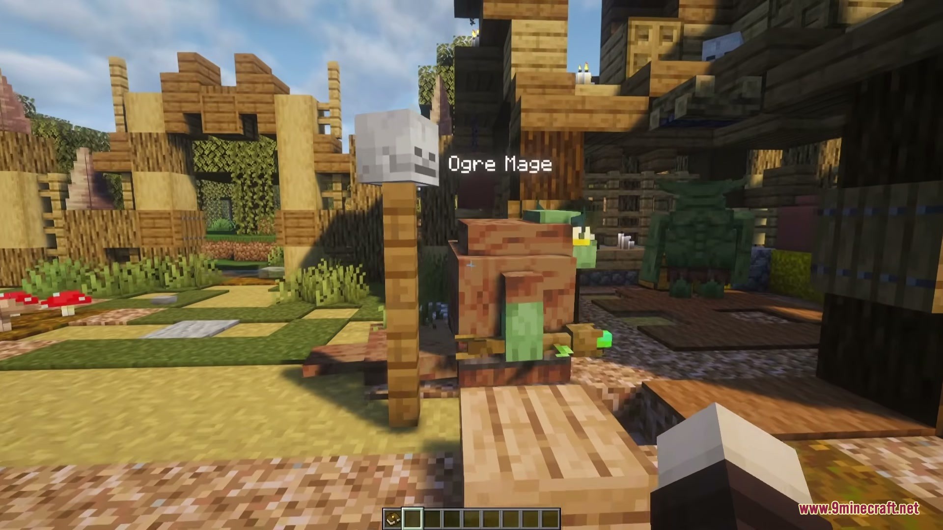 Kings & Monsters Mod Screenshot 3 An Ogre Mage stands near a skull pole in a wooden camp