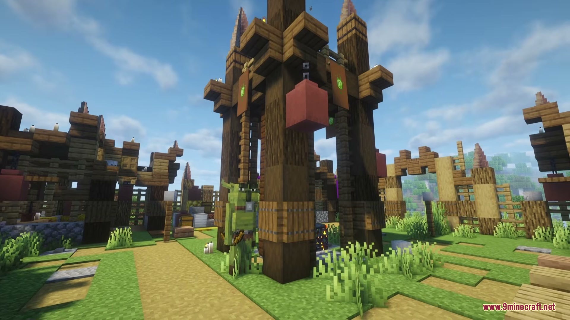 Kings & Monsters Mod Screenshot 5 A green ogre stands guard near a tall wooden tower in camp