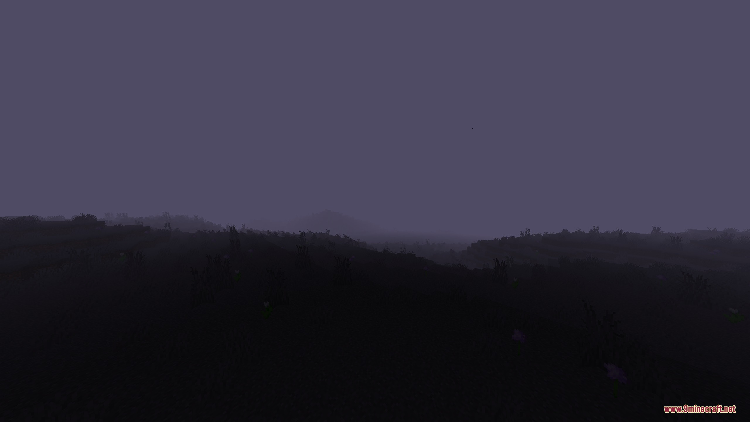 A vast dark landscape with rolling hills in the Sorrowlands biome