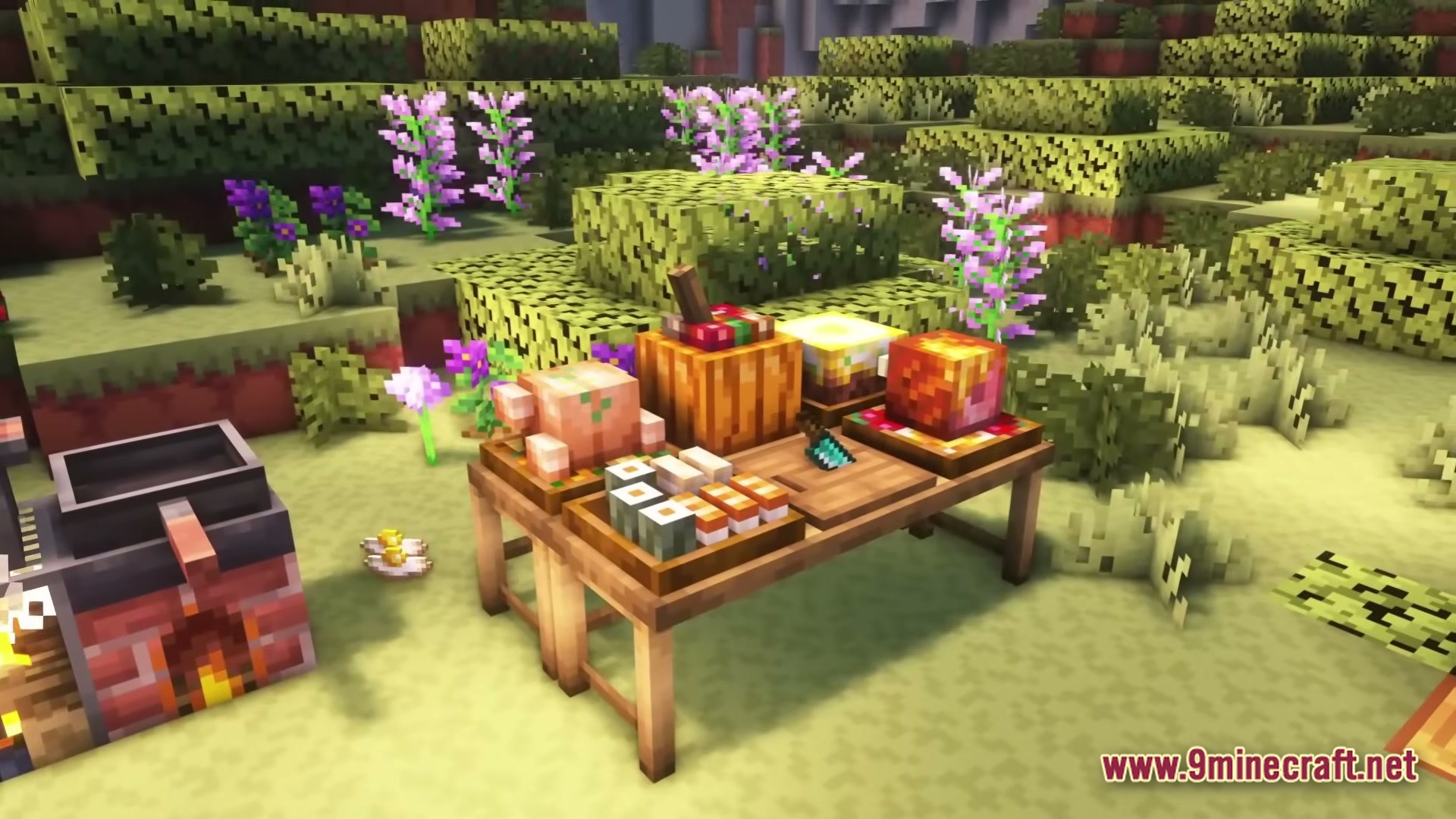 LOVERNITE ADVENTURE 1 Modpack Screenshot 4 Various food items and a cutting board arranged on a wooden table outdoors near a stove