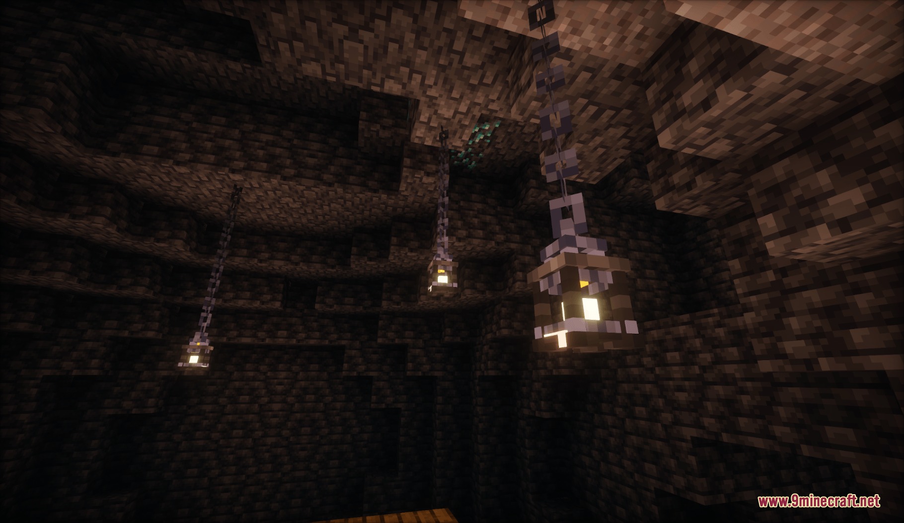 Lanterns with Candles Resource Pack Screenshot 2 Detailed 3D lanterns with animated candle flames hanging in a dark cave