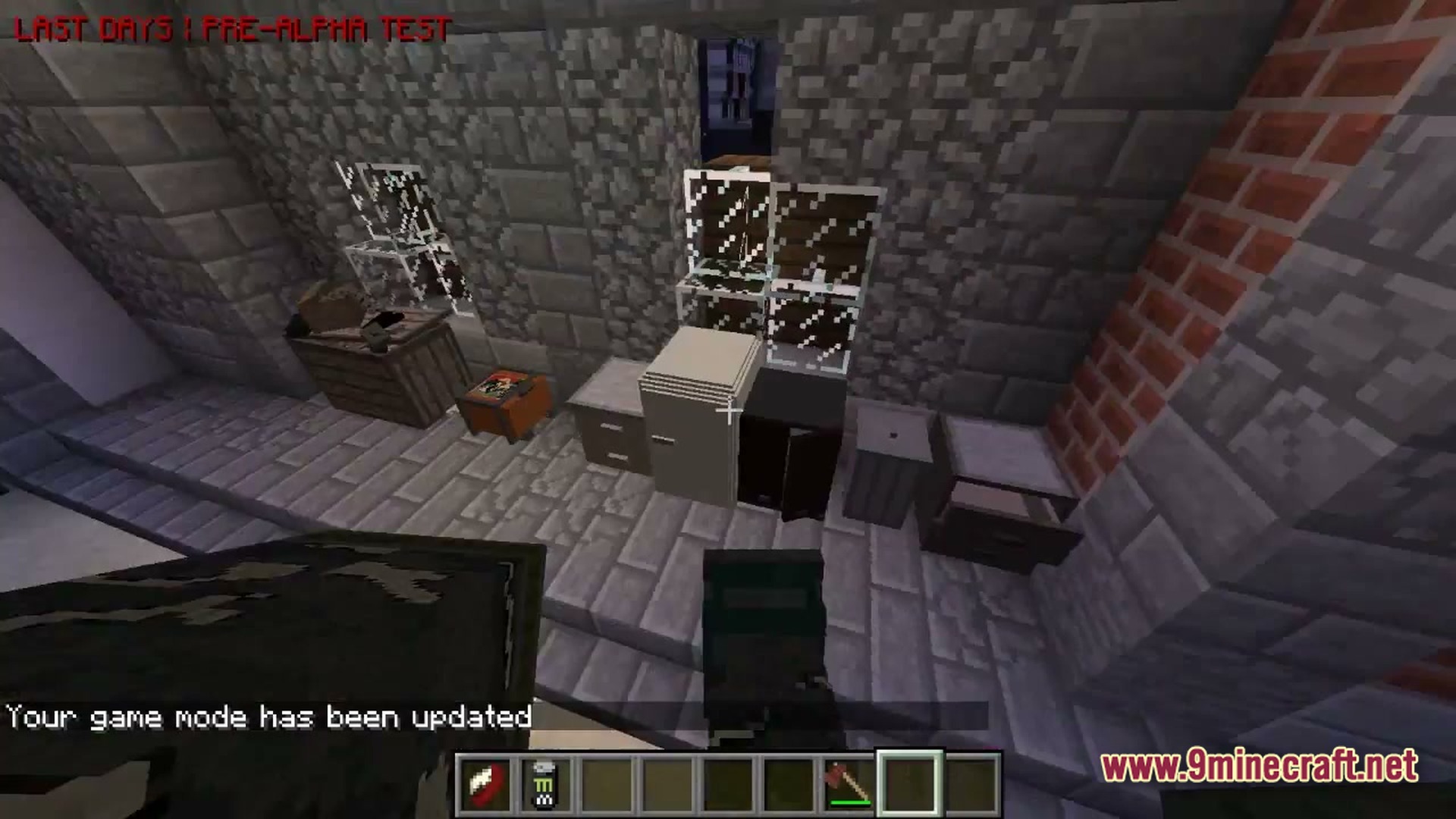 A stone interior featuring various modern furniture items including a refrigerator, cabinets, and storage crates