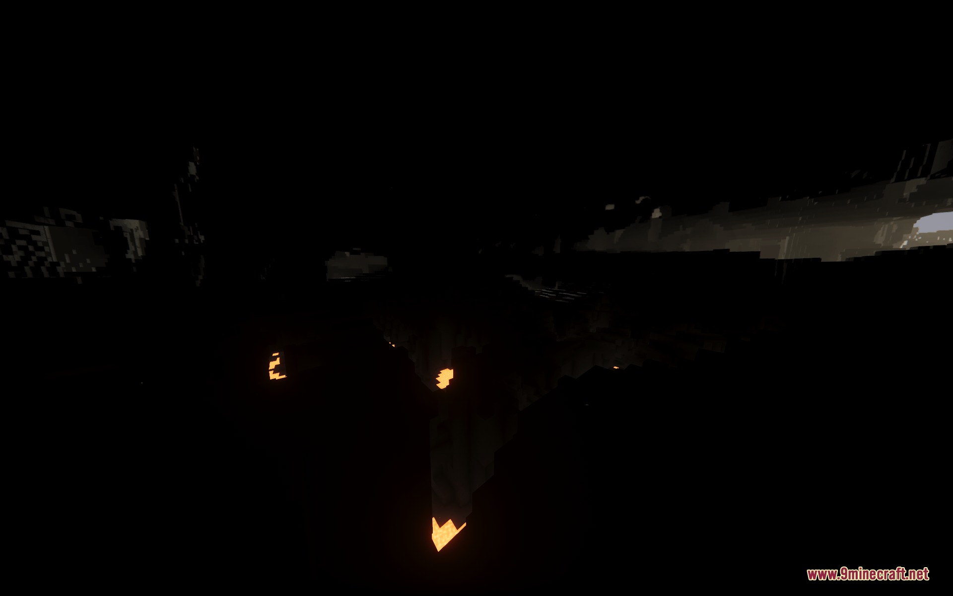 Latex Caves Mod Screenshot 5 A dark underground cavern with small glowing orange lights in the distance