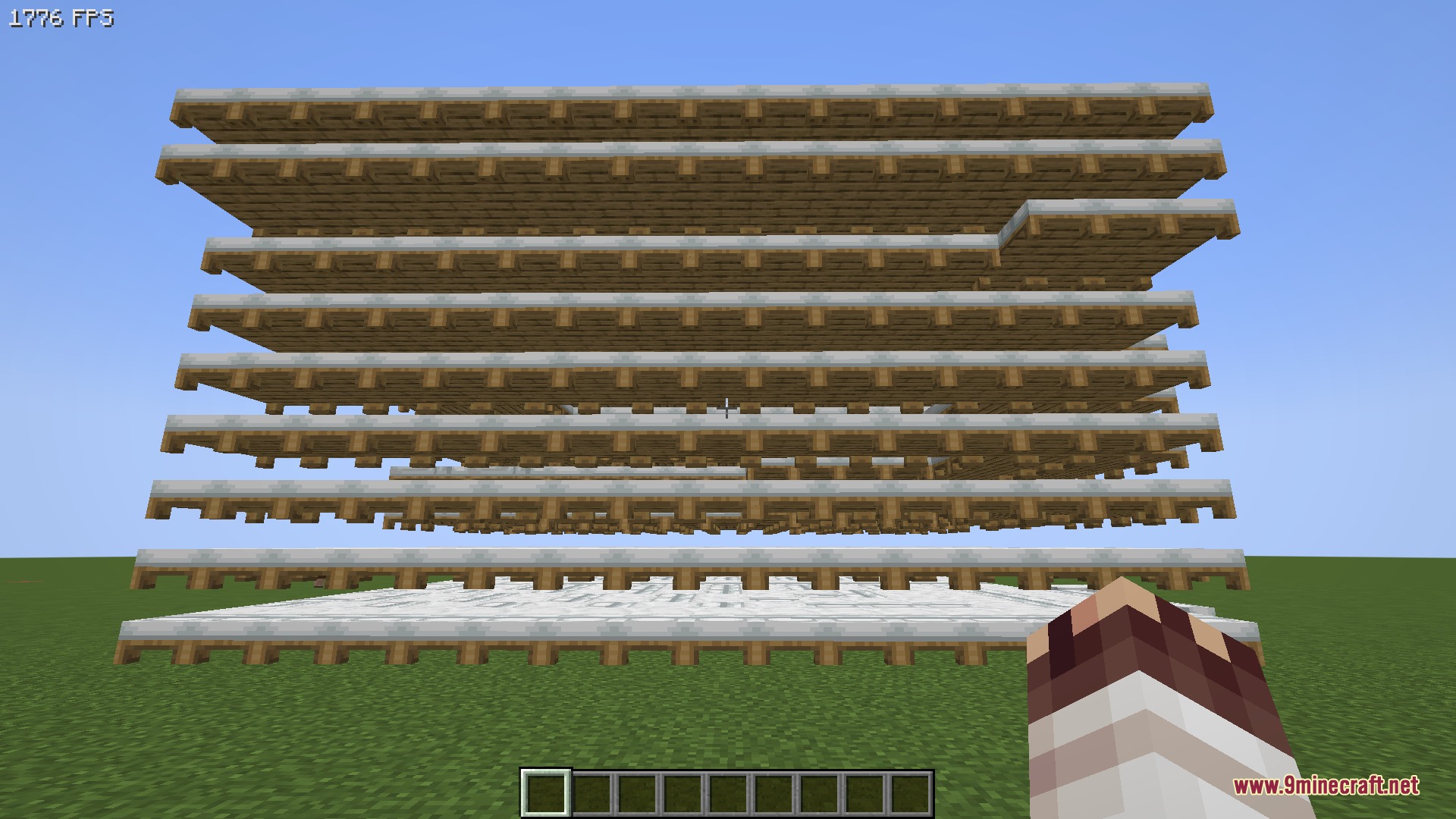 Multiple rows of white beds stacked high to demonstrate rendering efficiency
