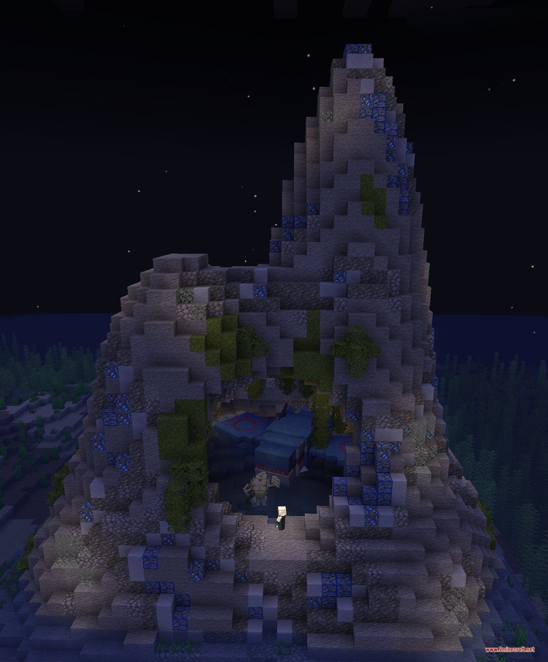 Legends & Myths Data Pack Screenshot 2 A player stands before a massive stone mountain structure with glowing blue blocks
