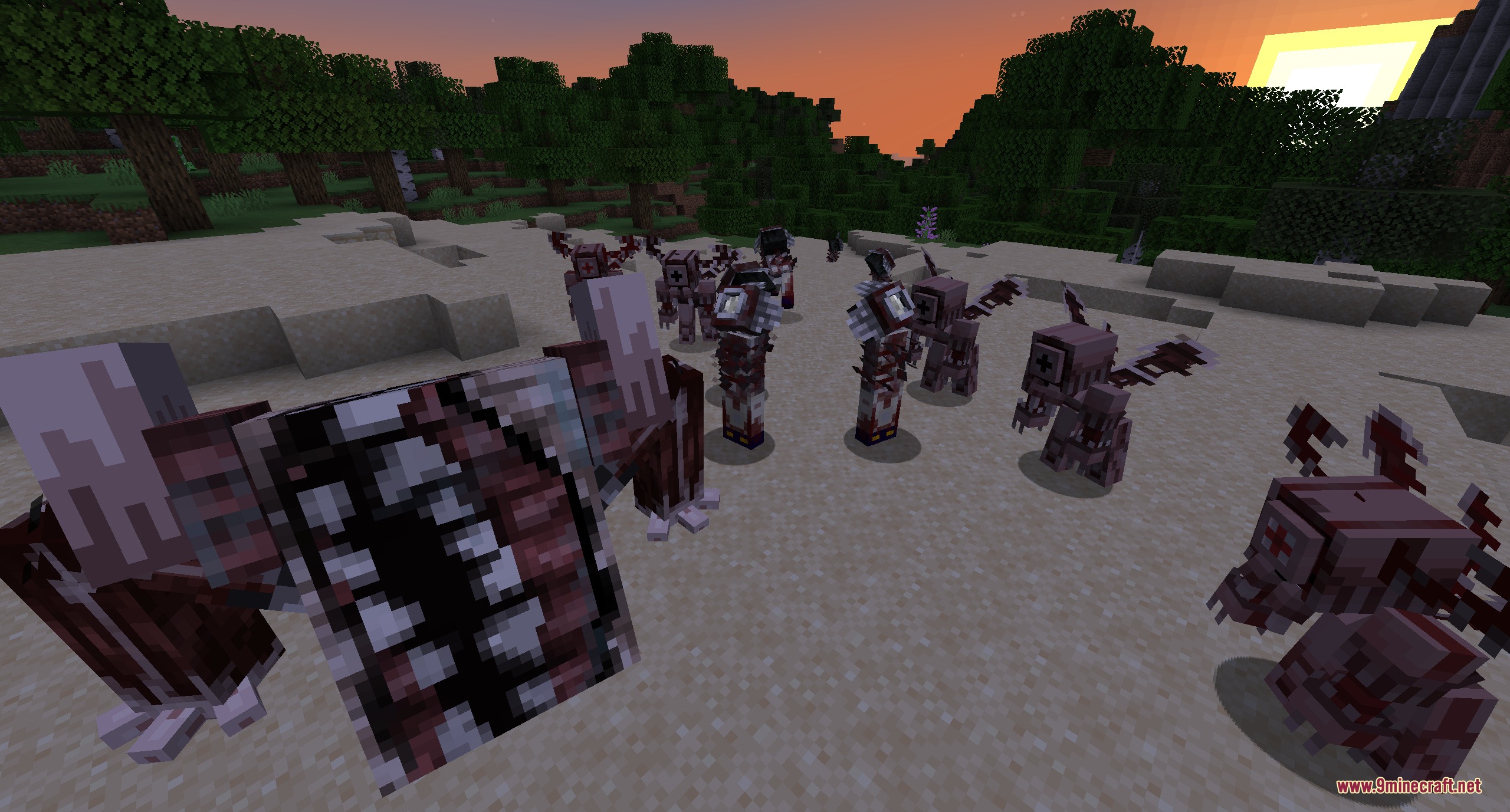 Legs and Arm's UNDEAD Pack Resource Pack Screenshot 2 A group of scary mutated undead creatures standing on sand at sunset
