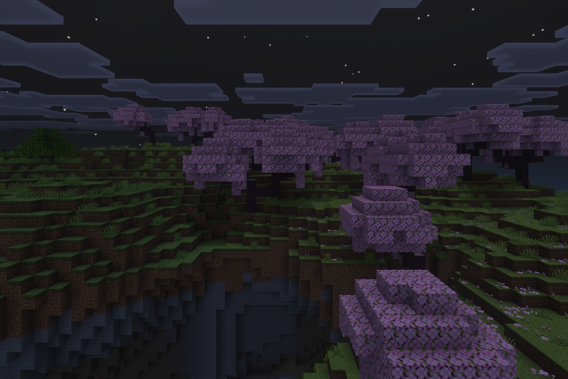 Lilium Dynamic Light Addon Screenshot 2 Pink cherry trees overlooking a dark cave entrance under the night sky
