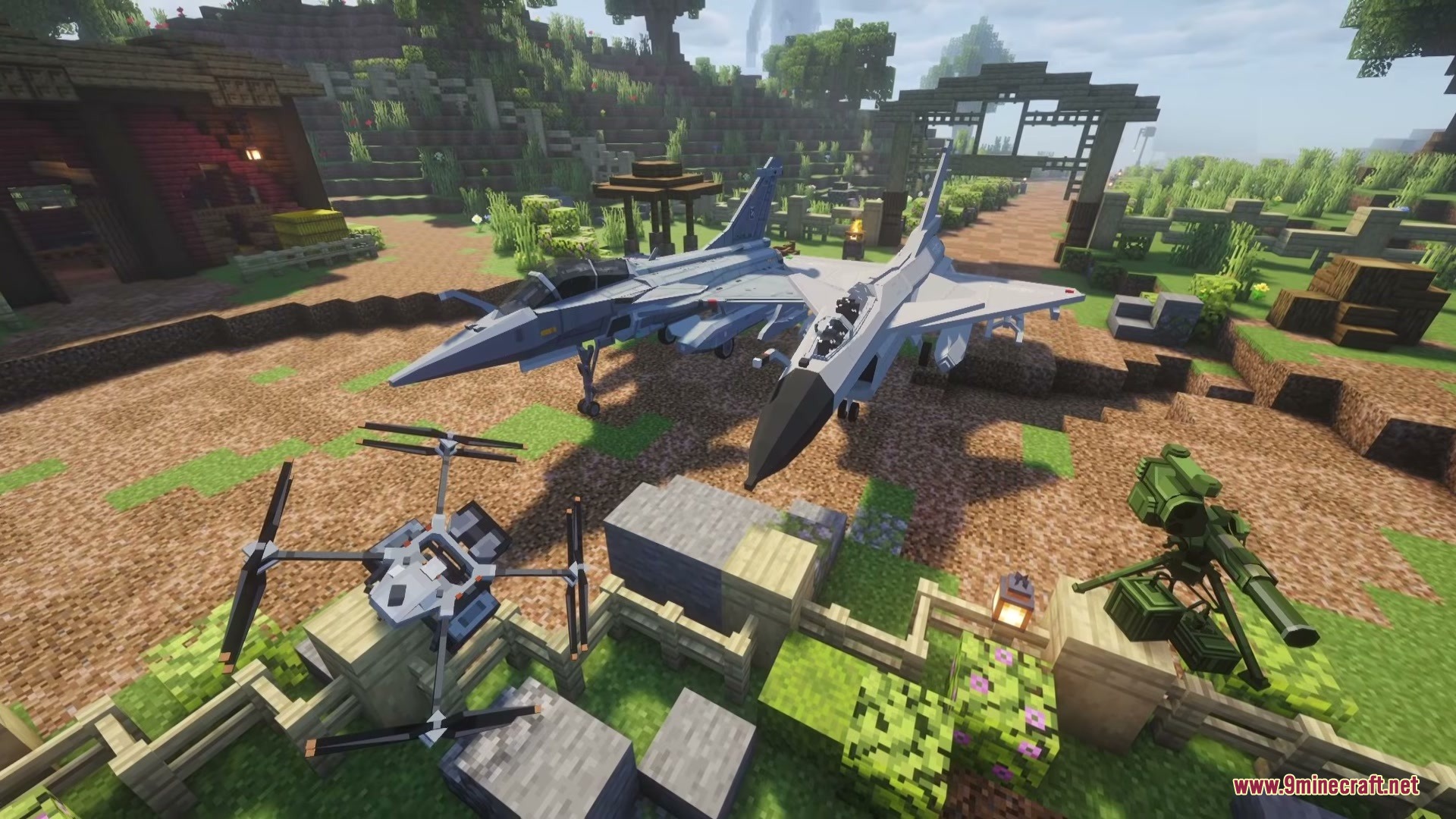 Limitless Vehicle Mod Screenshot 10 Fighter jets and military equipment displayed in a grassy Minecraft field