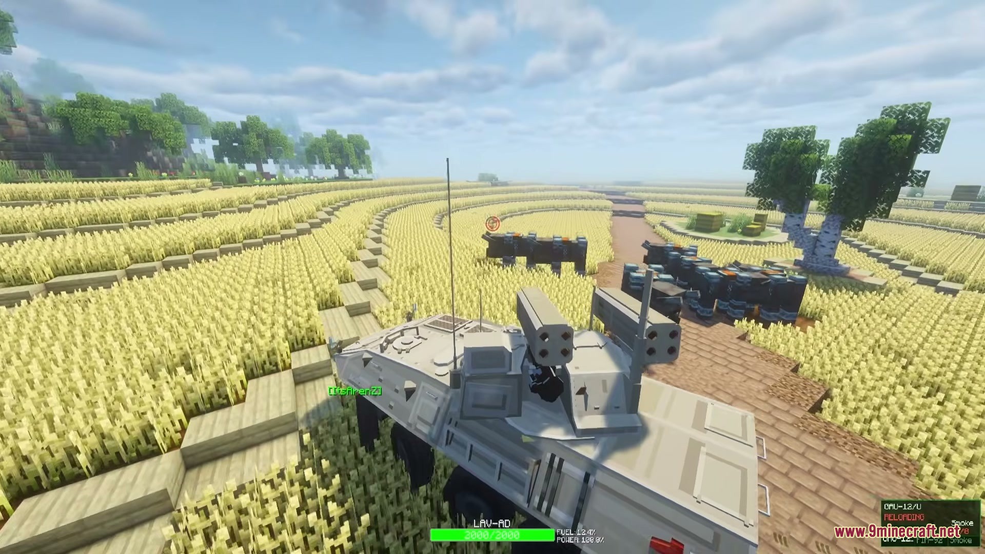 Limitless Vehicle Mod Screenshot 7 A white military vehicle with missile launchers drives through a wheat field
