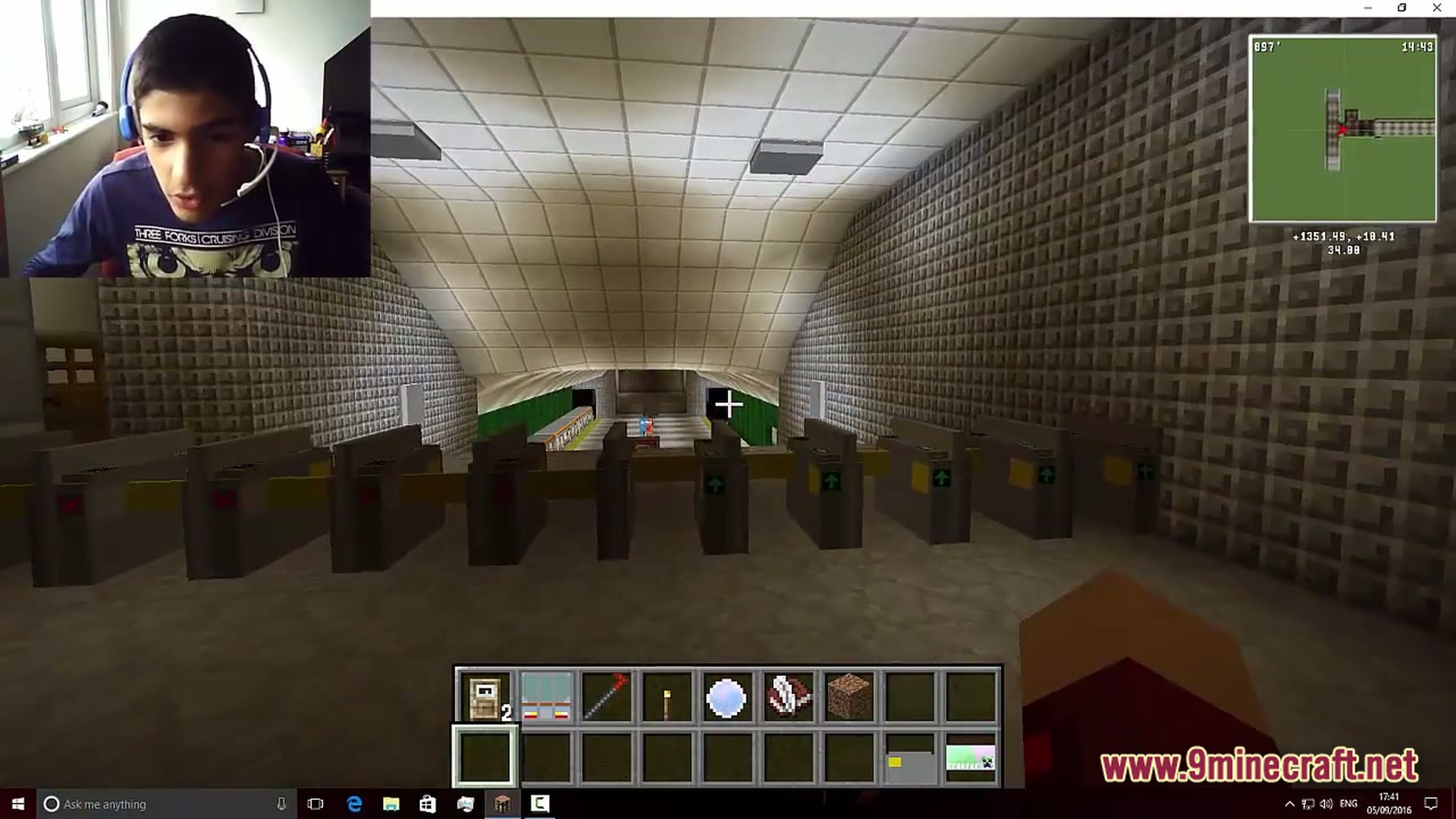 Lithic Progression Modpack Screenshot 1 A row of ticket gates leads into a large underground subway station with a vaulted ceiling