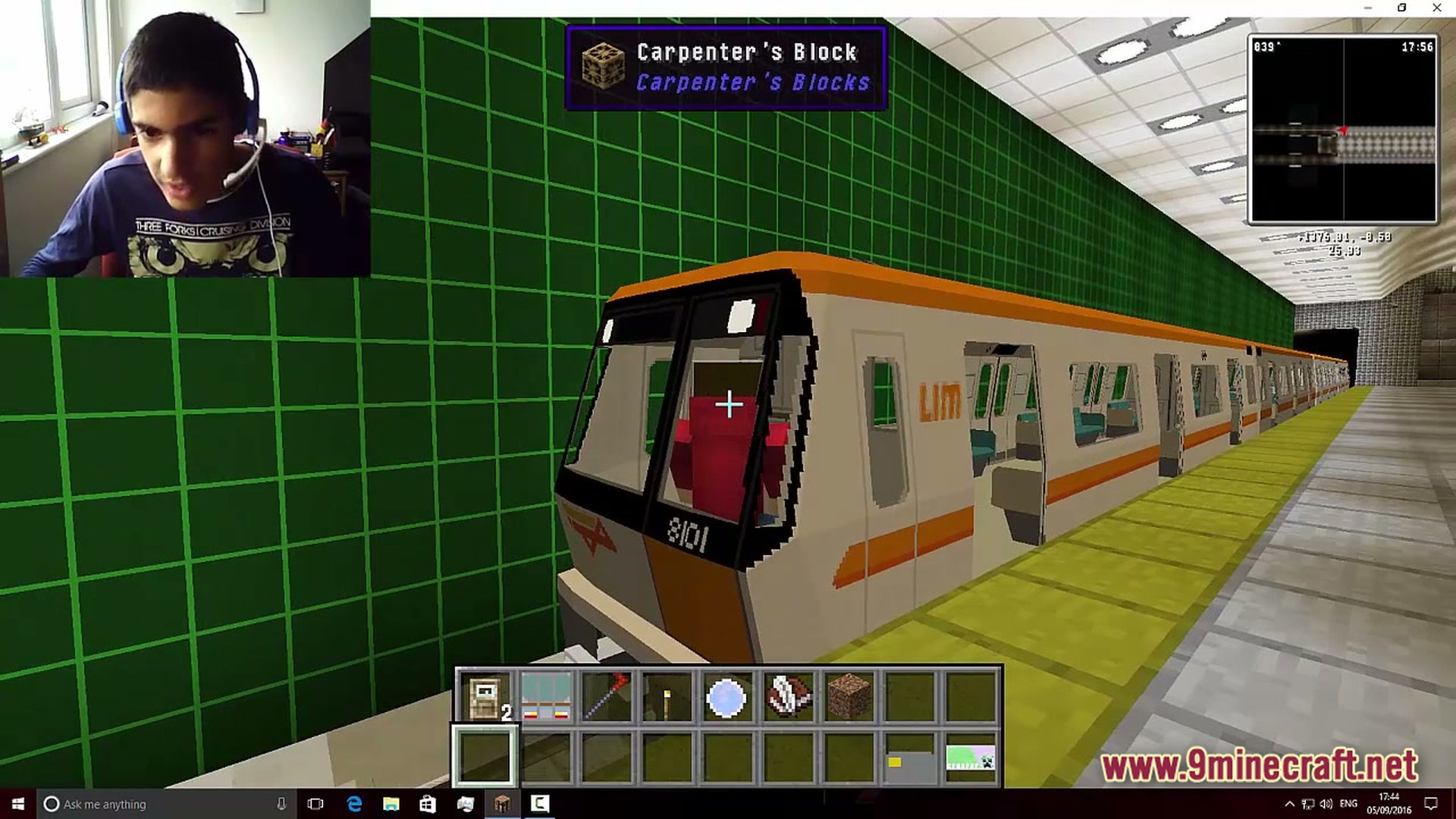 Lithic Progression Modpack Screenshot 2 A player operates a detailed subway train at a station with green tiled walls